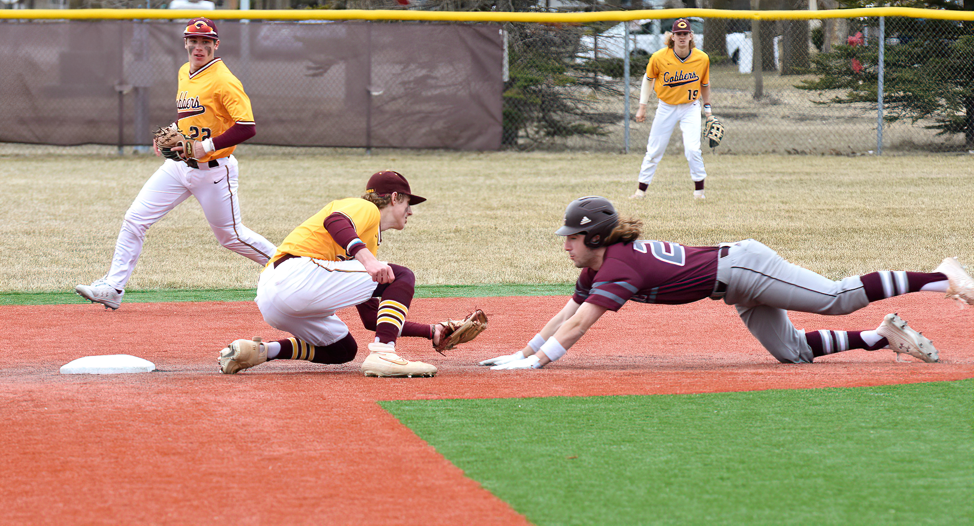 Cobber shortstop Thomas Horan waits to apply the tag to a would-be base stealer during the Cobbers' doubleheader with Augsburg.