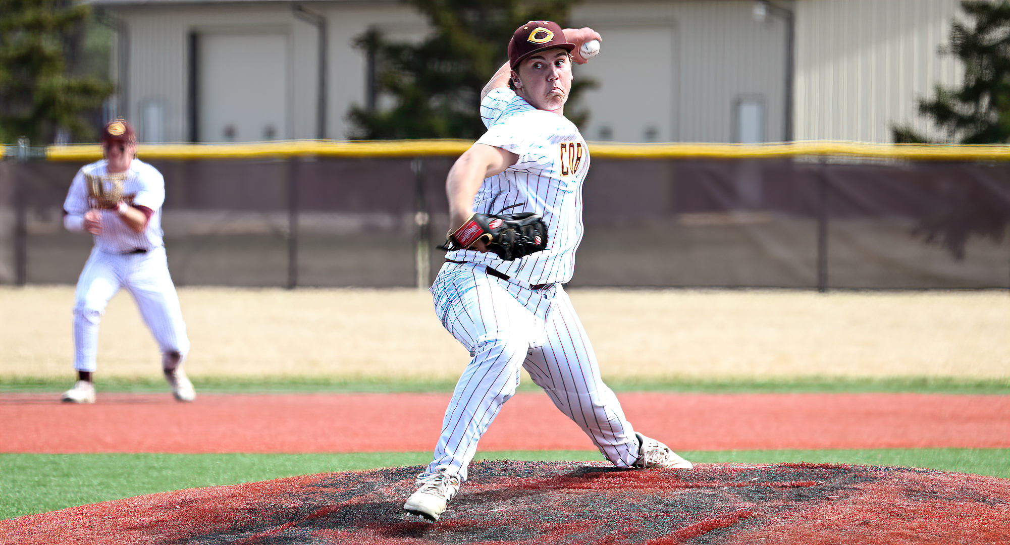 Sophomore J Riley Ohm delivers a pitch in the seventh inning of Game 1 in the Cobbers' doubleheader with Bethel.