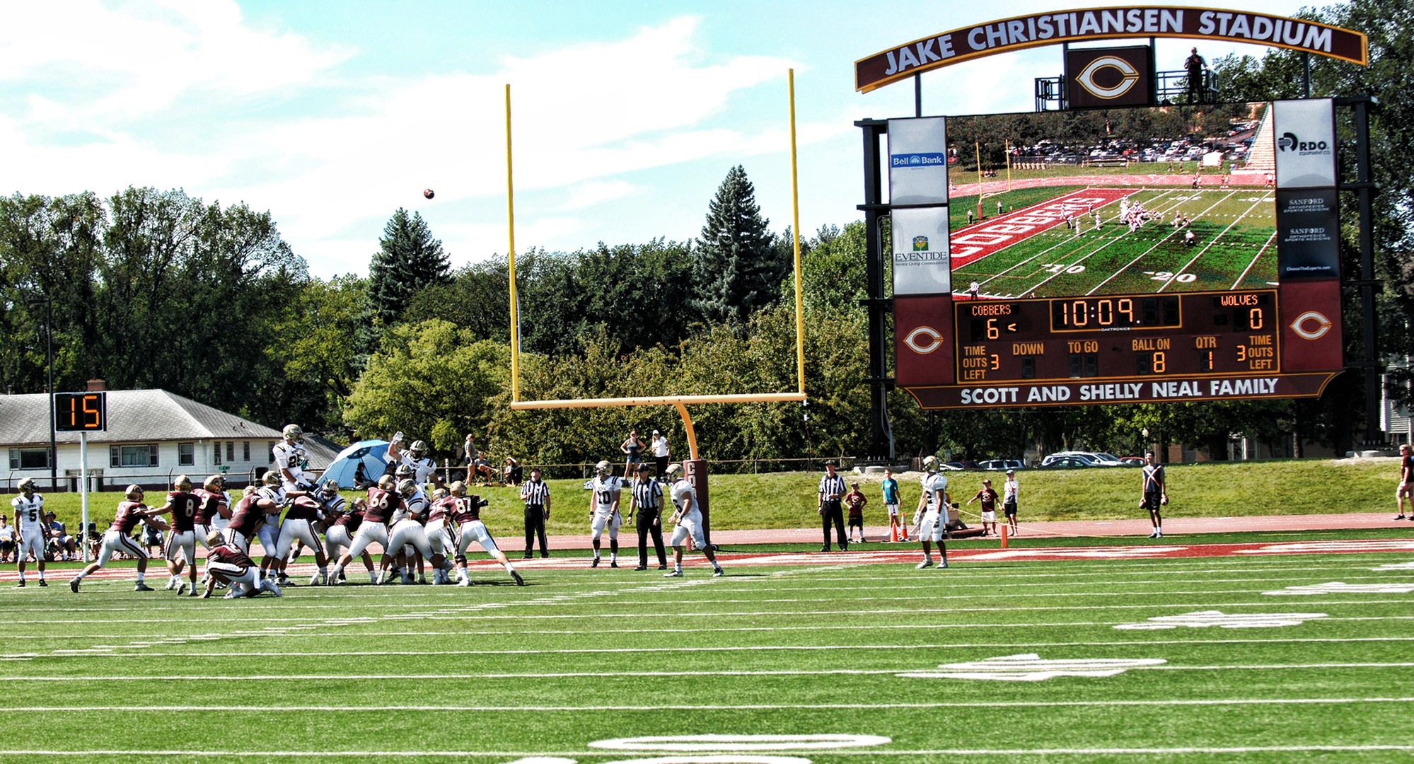 Senior kicker Tony Marzolf connects on an extra point in the Cobbers' season-opening win over Neb. Wesleyan which was the debut of the brand new $1 million scoreboard.