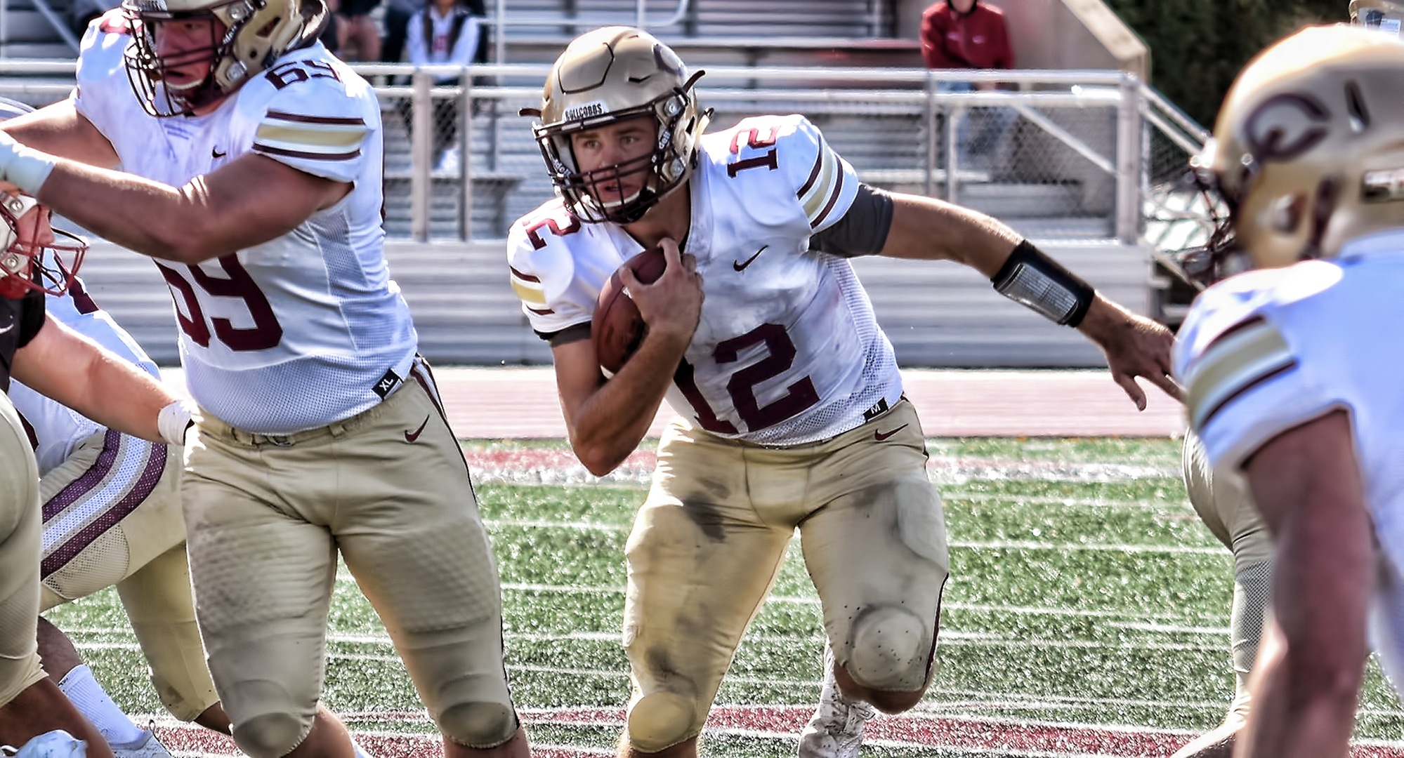 Senior quarterback Blake Kragnes breaks free for a big rushing gain during the Cobbers' win at Hamline. He finished with a season-high 101 yards on the ground.