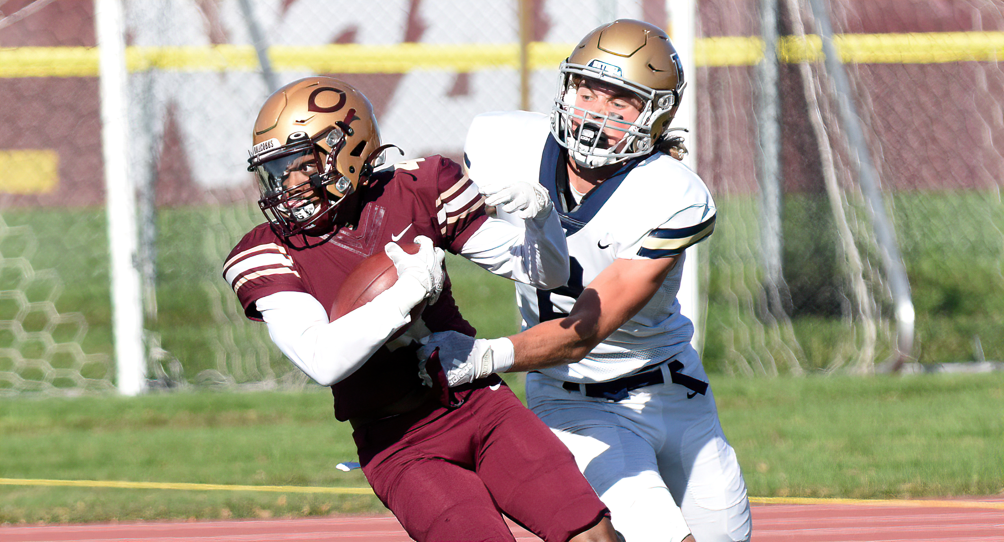 Senior Noble Scott steps in front of a Bethel receiver to make a TD-saving interception during the fourth quarter of the Cobbers' game with BU.