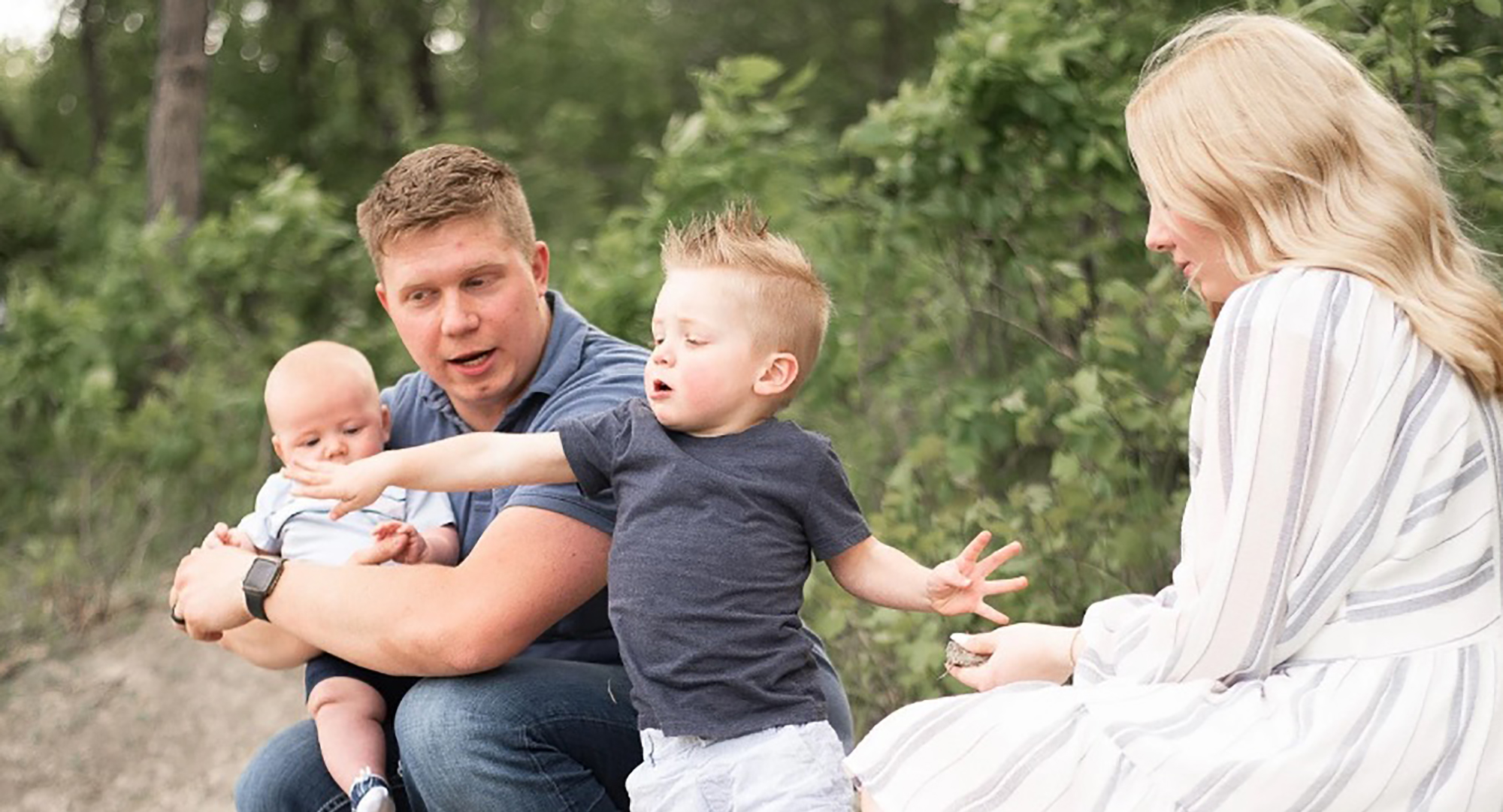 Senior Collin Thompson, left, is married to Alex Thompson, right. Thompson has a 3-year-old stepson Liam, center, and seven-month-old son Callum.