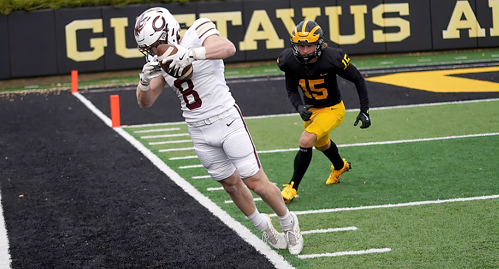 Owen Miller tiptoes the sideline for one of his five catches in the Cobbers' game at Gustavus. (photo courtesy of Gustavus SID)