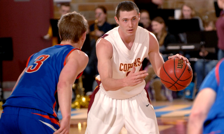 Senior Ryan Rude directs the offense on his way to a season-high 13 points in the Cobbers' 63-52 win over Macalester.
