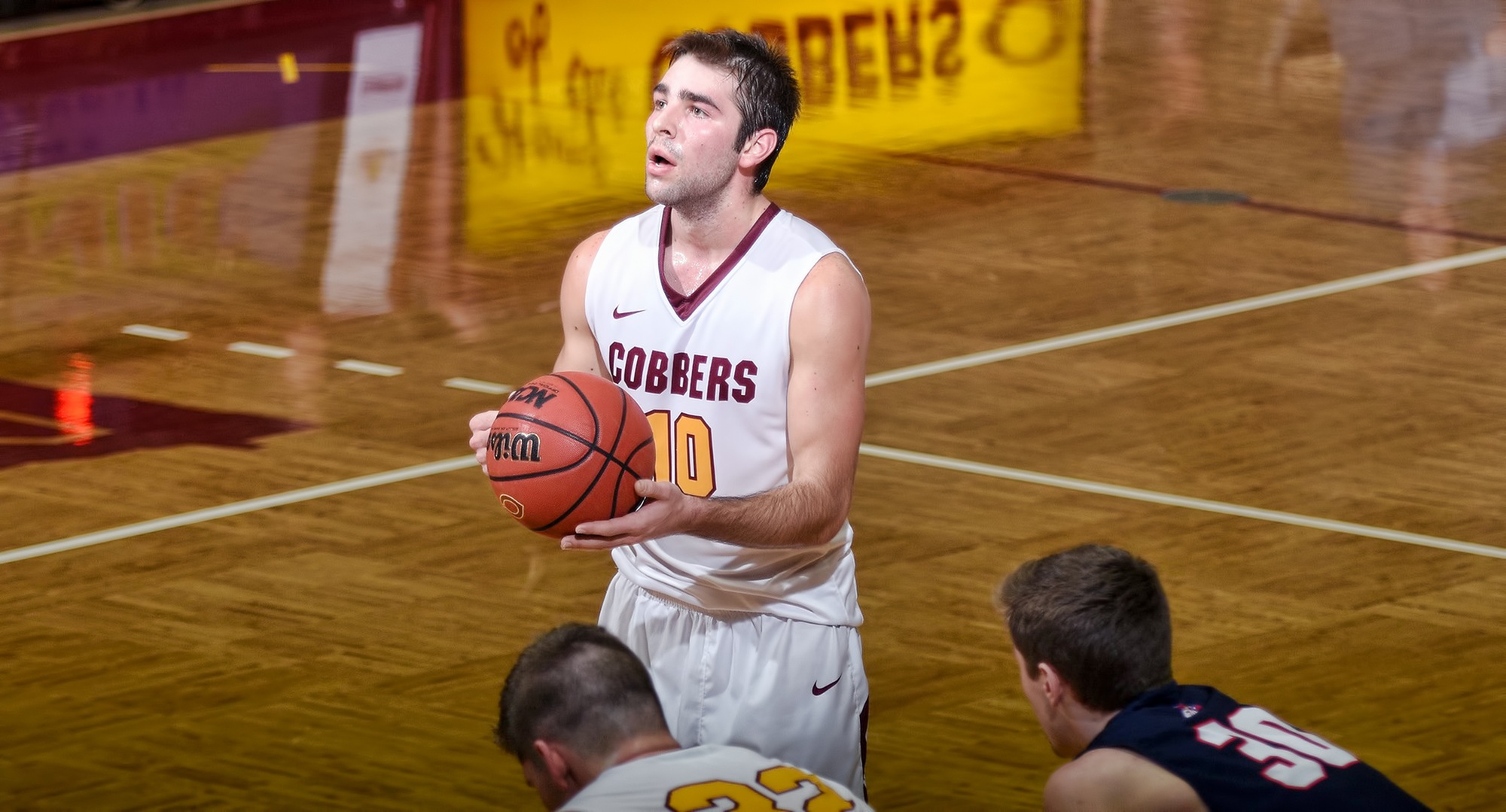Senior Tommy Schyma gets ready to drain a free throw during the second half of the Cobbers' Senior Celebration Day against St. Mary's. Schyma finished with 25 points and 10 rebounds in his first game back since Dec. 14.