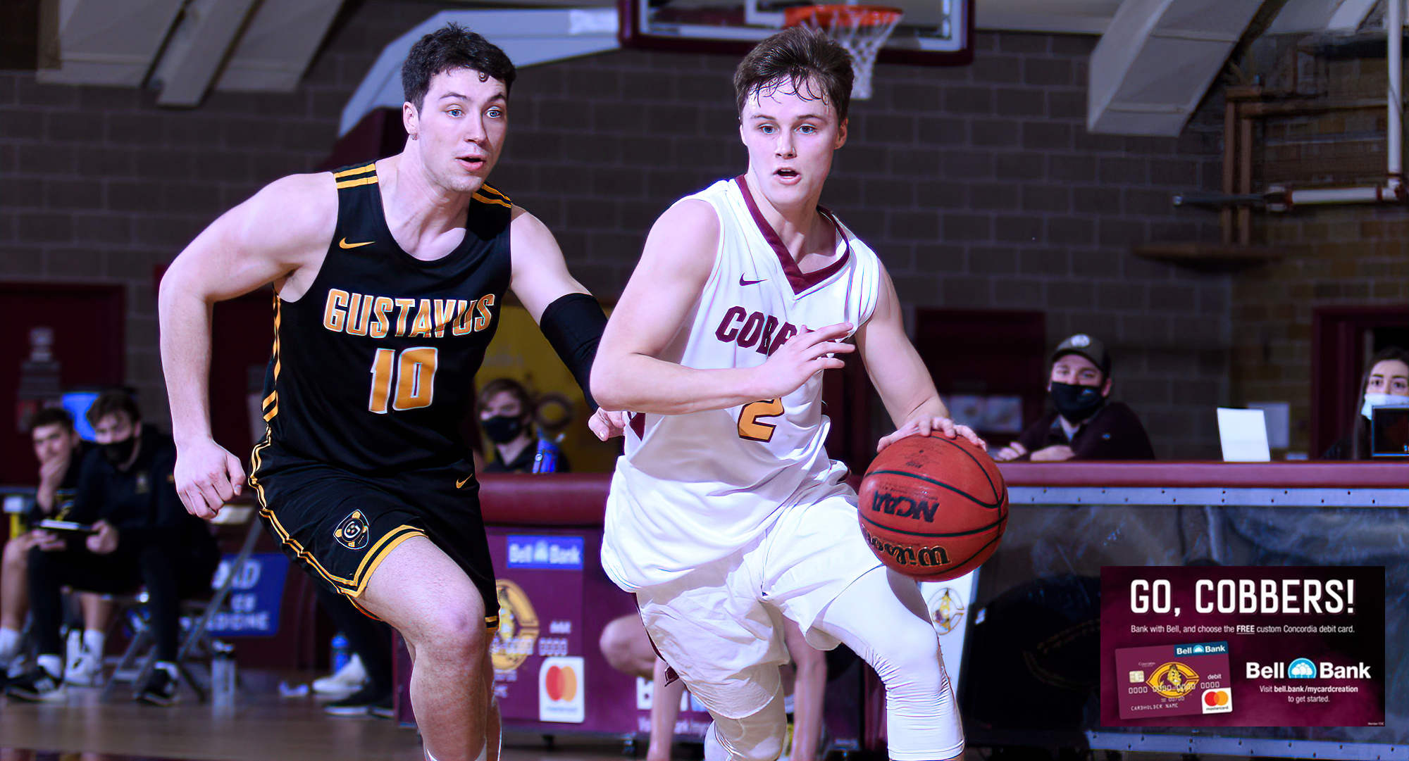 Sophomore Jackson Jangula drives to the basket during the second half of the Cobbers' game with Gustavus. Jangula had a team-high 13 points.