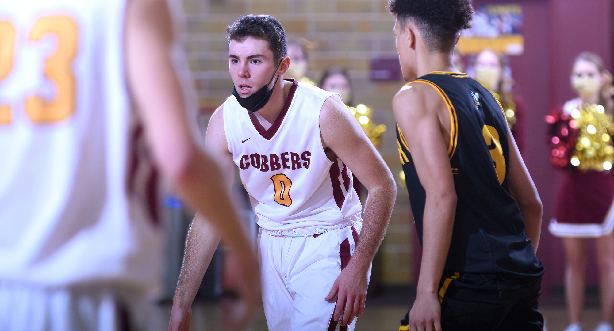 Charlie Rasmussen brings the ball up the court in the Cobbers' game with Wis.-Superior. He finished with 10 points and a team-high six rebounds.