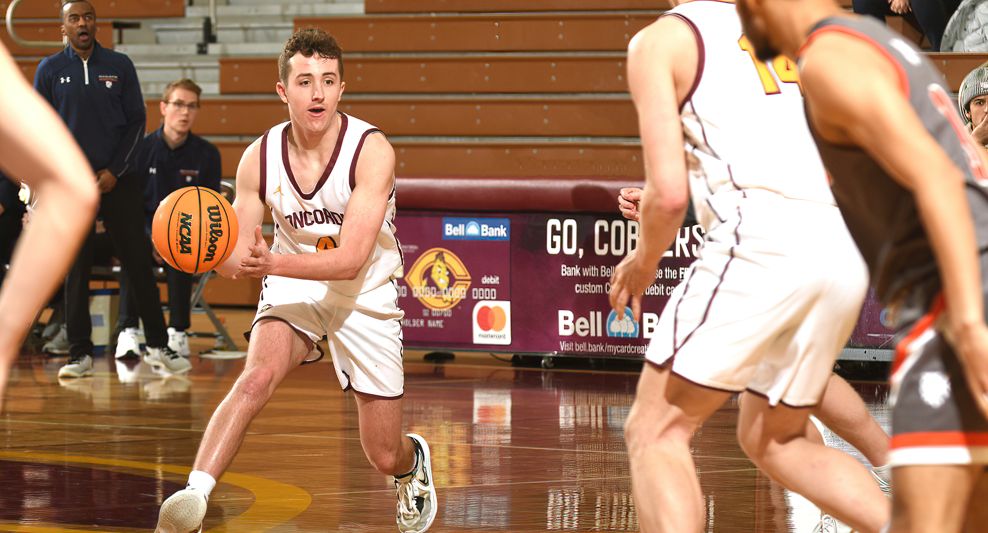 Zach Jackson makes an entry pass duting the second half of the Cobbers' win over Macalester. He tied his career-high point total in the game.