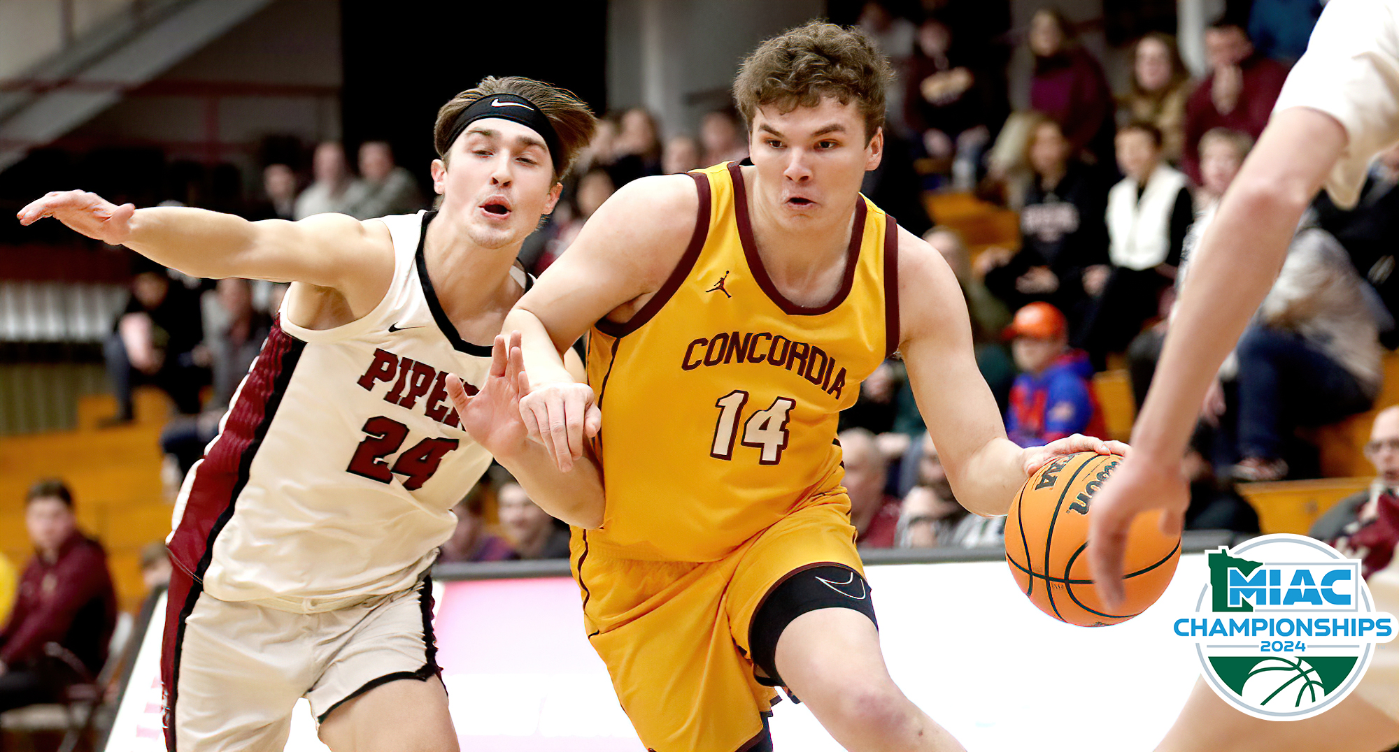 Rowan Nelson drives past a Hamline player in the first half of the Cobbers' quarterfinal game. (Photo courtesy of Ryan Coleman, d3photography).