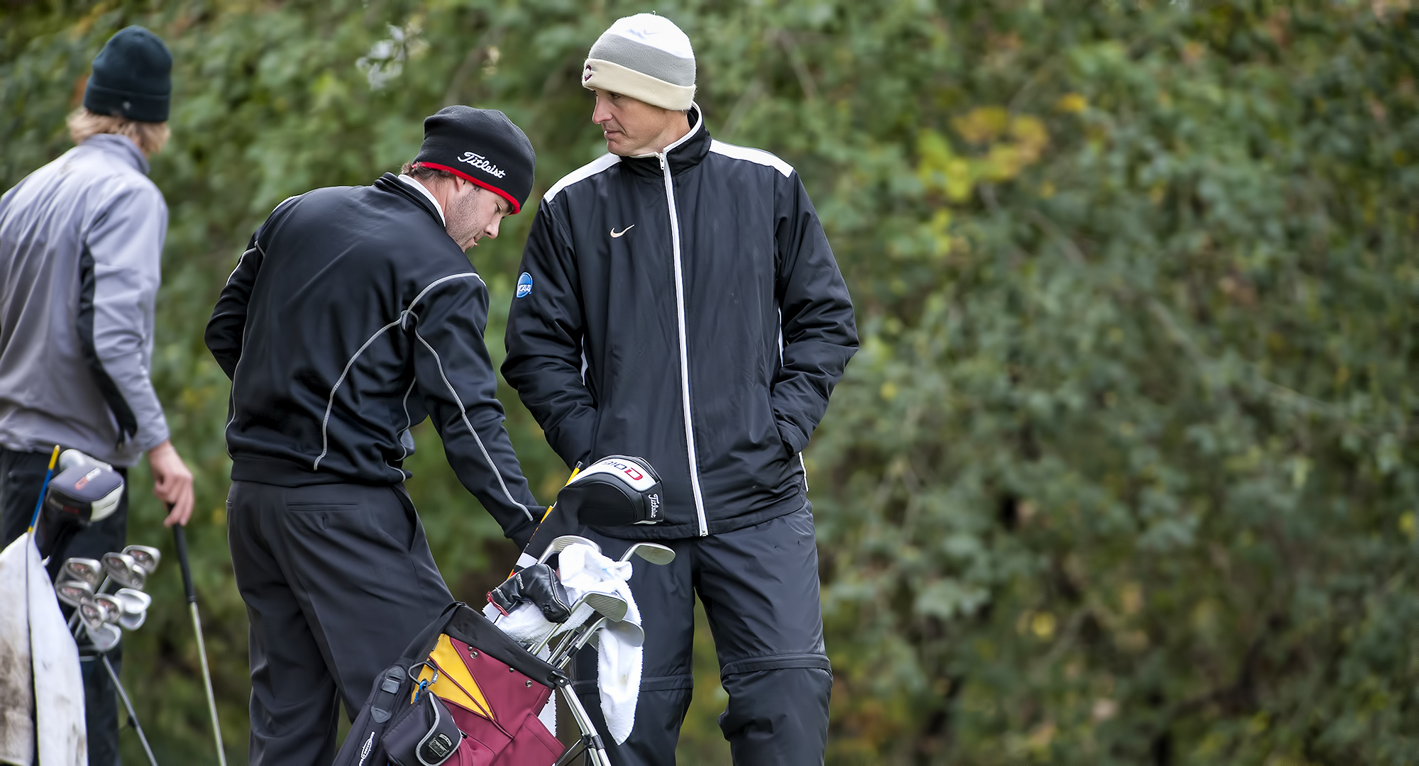 Chris Howe (center) was named the new head coach for the Cobber men's golf program. He has been the assistant coach for the past 10 years.