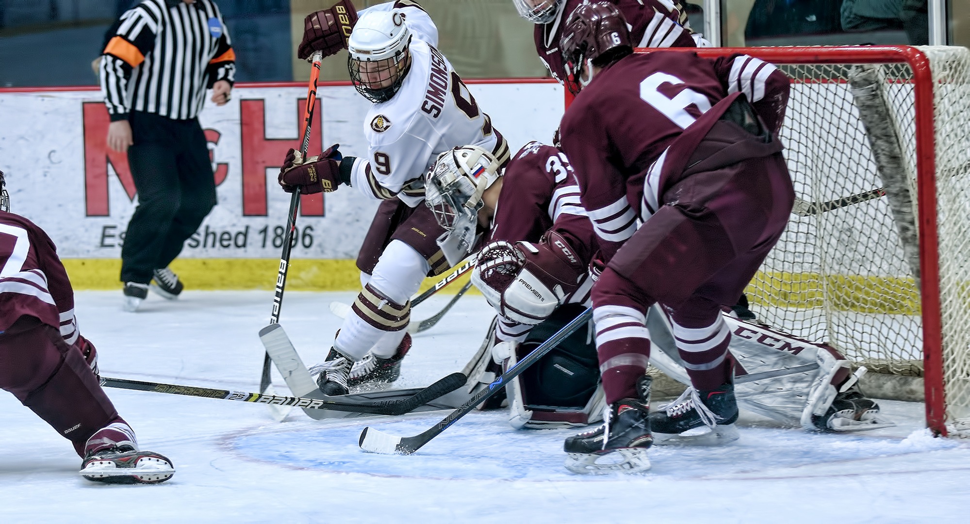 Parker Simonson looks to slide home a rebound in the second period of the Cobbers' semifinal win over Augsburg. He had two goals in CC's 3-2 win.