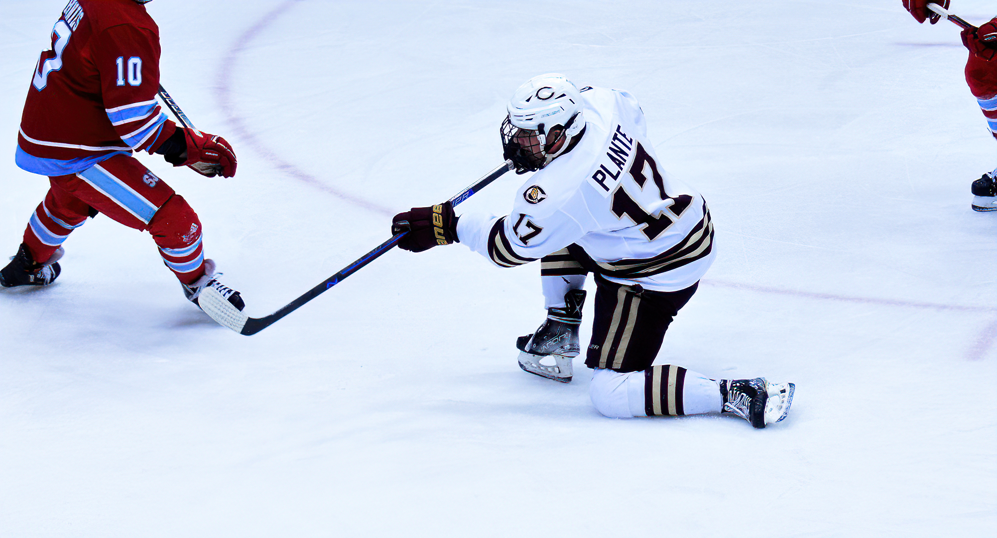 Mason Plante drops to one knee to fire home the Cobbers' lone goal in the series finale with SJU. The goal was Plante's seventh of the year.