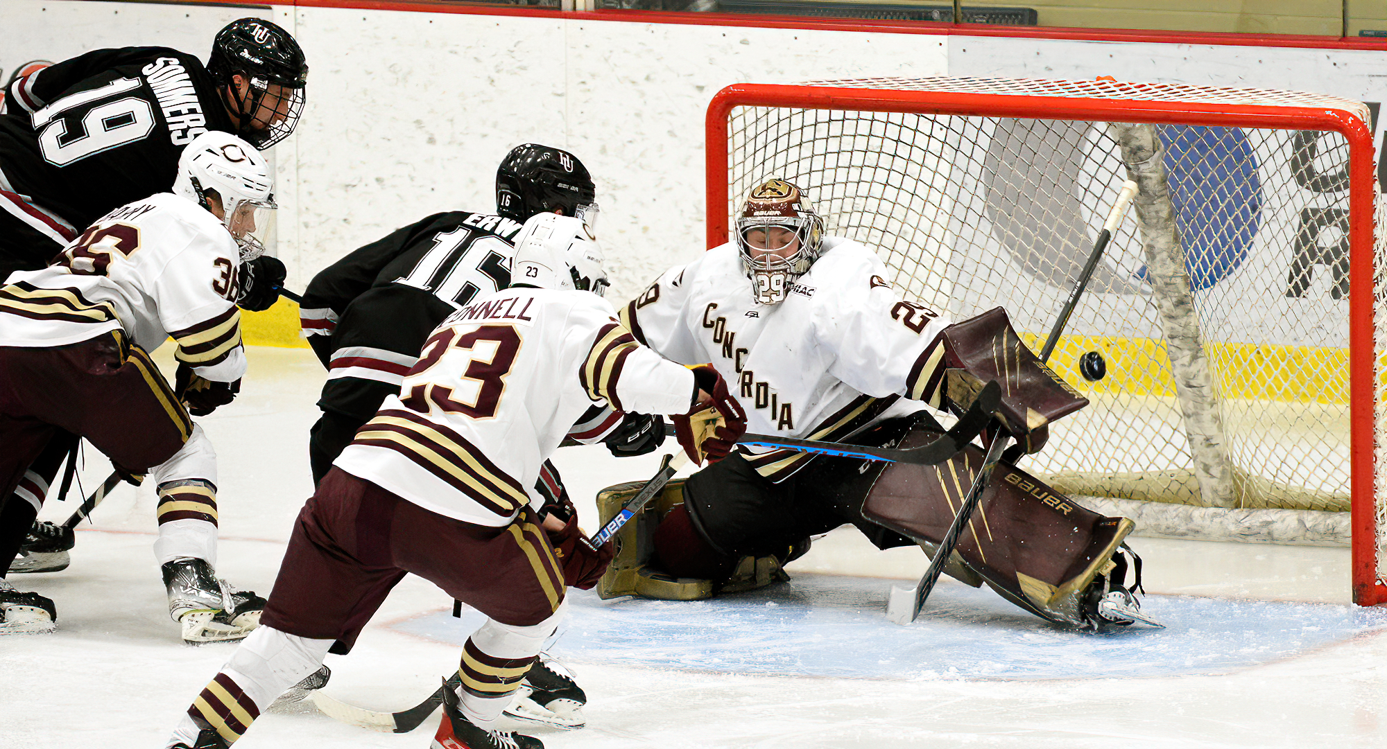 Junior goalie Aaron Dickstein makes one of his 24 saves in the Cobbers' 2-1 win over Hamline that clinched the series sweep for CC.