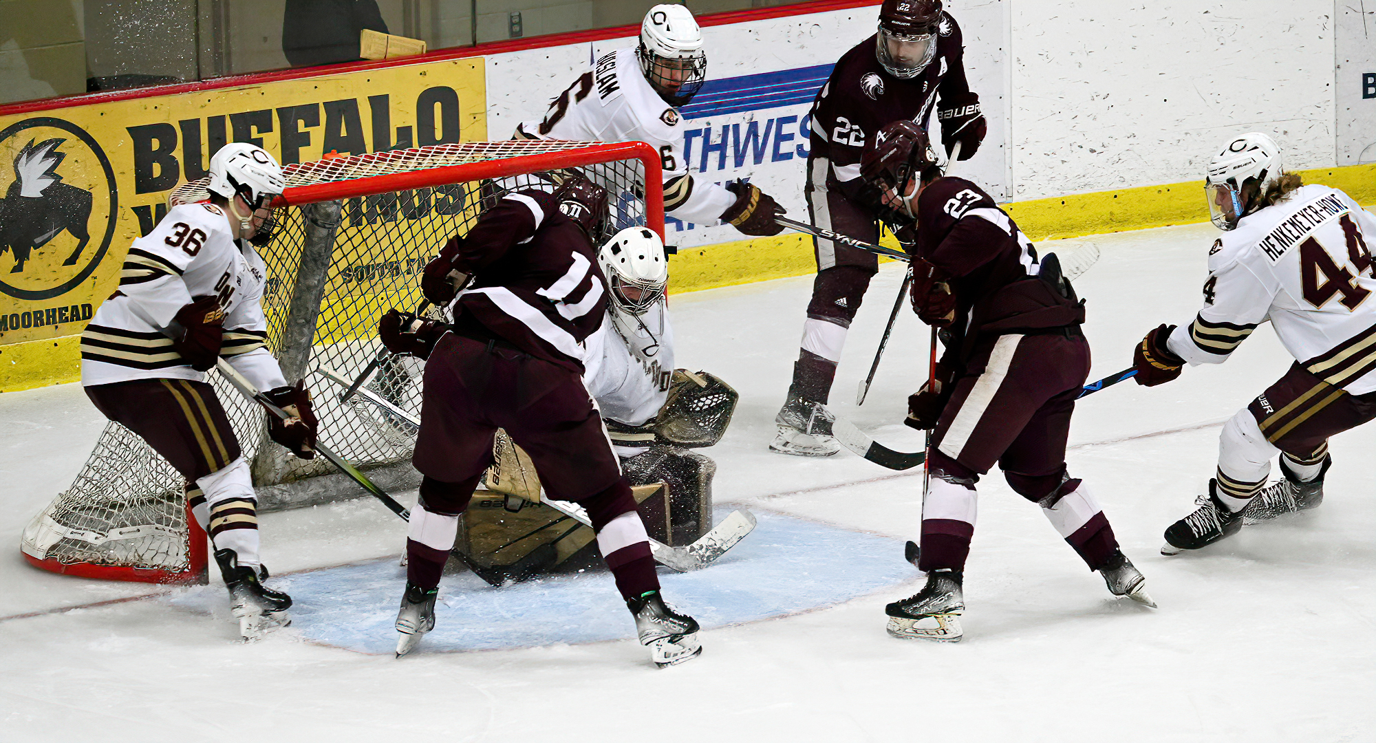 Senior goalie Matt Fitzgerald makes one of his 25 saves in the Cobbers' series opener with Augsburg.