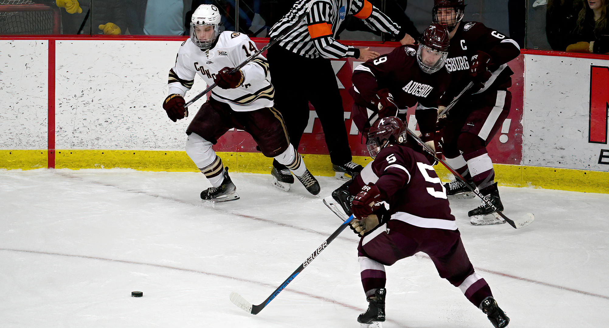 Sophomore Ben Luedtke comes out of the corner with the puck in the Cobbers' series finale with Augsburg. He set up the game-tying goal.