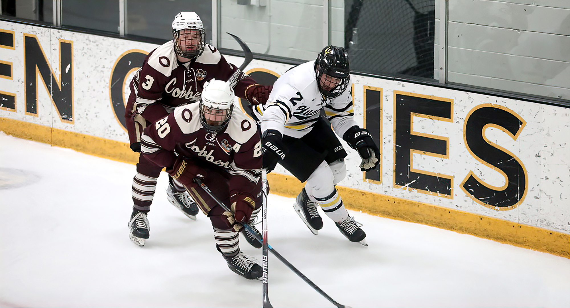Hanson O'Leary carries the puck out from behind the net in the Cobbers' series finale at Gustavus. (Photo courtesy of Gustavus SID).