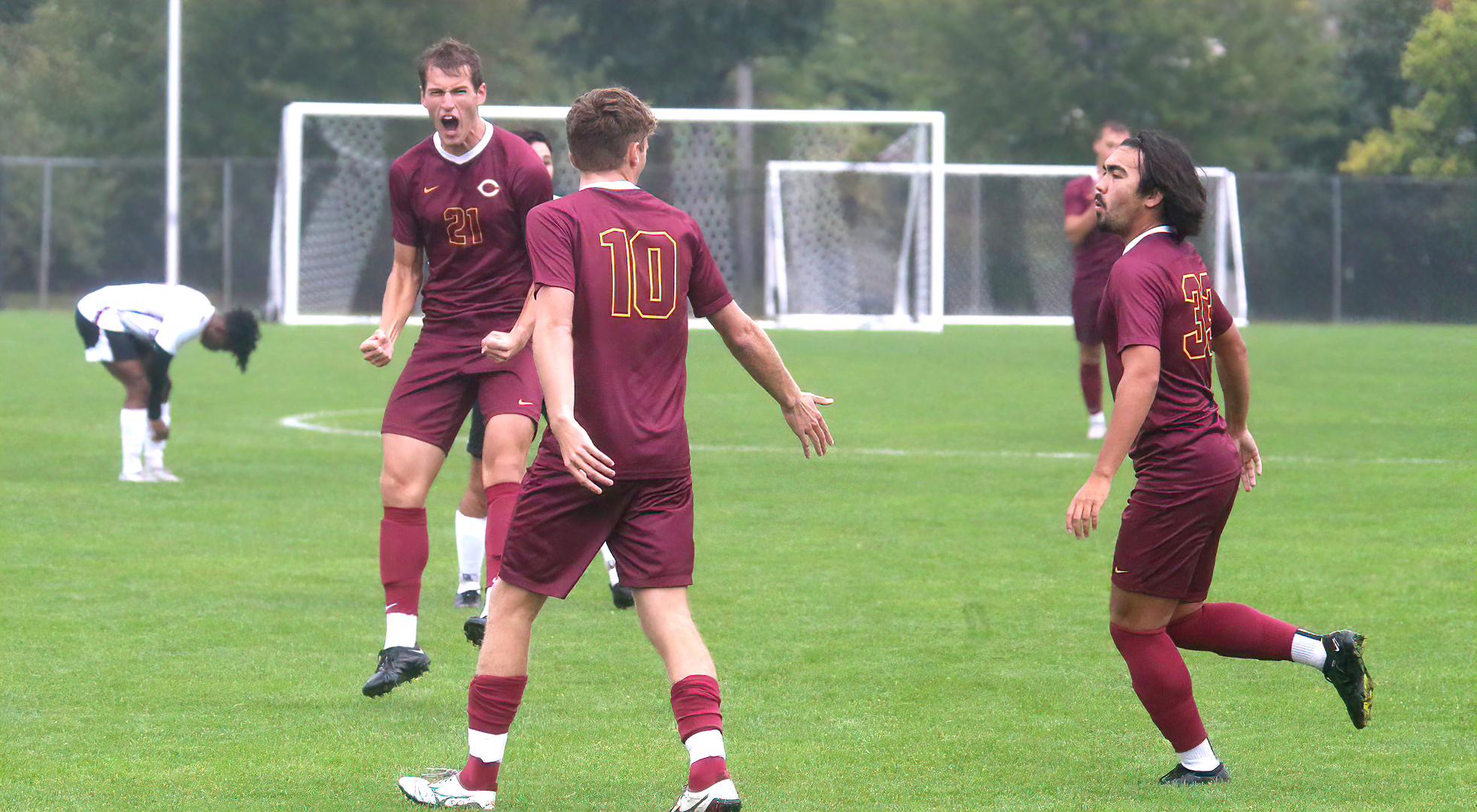 The Cobbers celebrate the goal from Gannon Brooks (#10) in the first half at Hamline. (Photo courtesy of Ryan Coleman - D3photography)