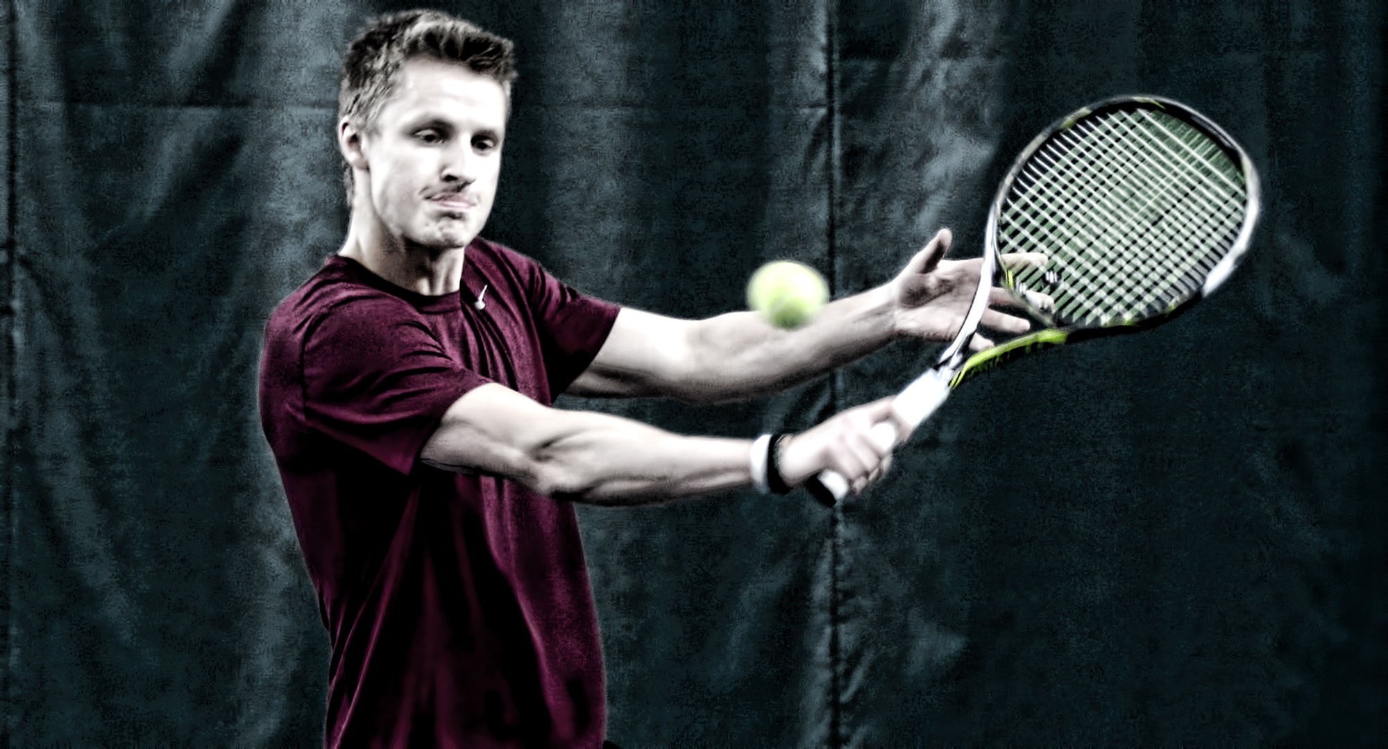 Senior Matthew Engum concentrates on a backhand slice during his 5-7, 6-2, 10-3 win at No.5 singles in the Cobbers' 9-0 win over St. Mary's.