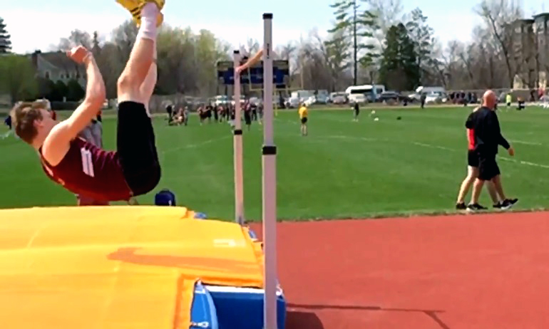 Jackson Schepp clears the bar in the high jump at the Carleton Relays. He finished fifth with a mark of 6-06.