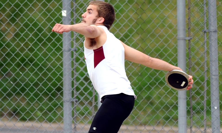 Joe Hendrickson gets ready to fling the discus in the MIAC decathlon. He scored a career-high 5,881 points and finished second. (Photo courtesy of Carleton SID)