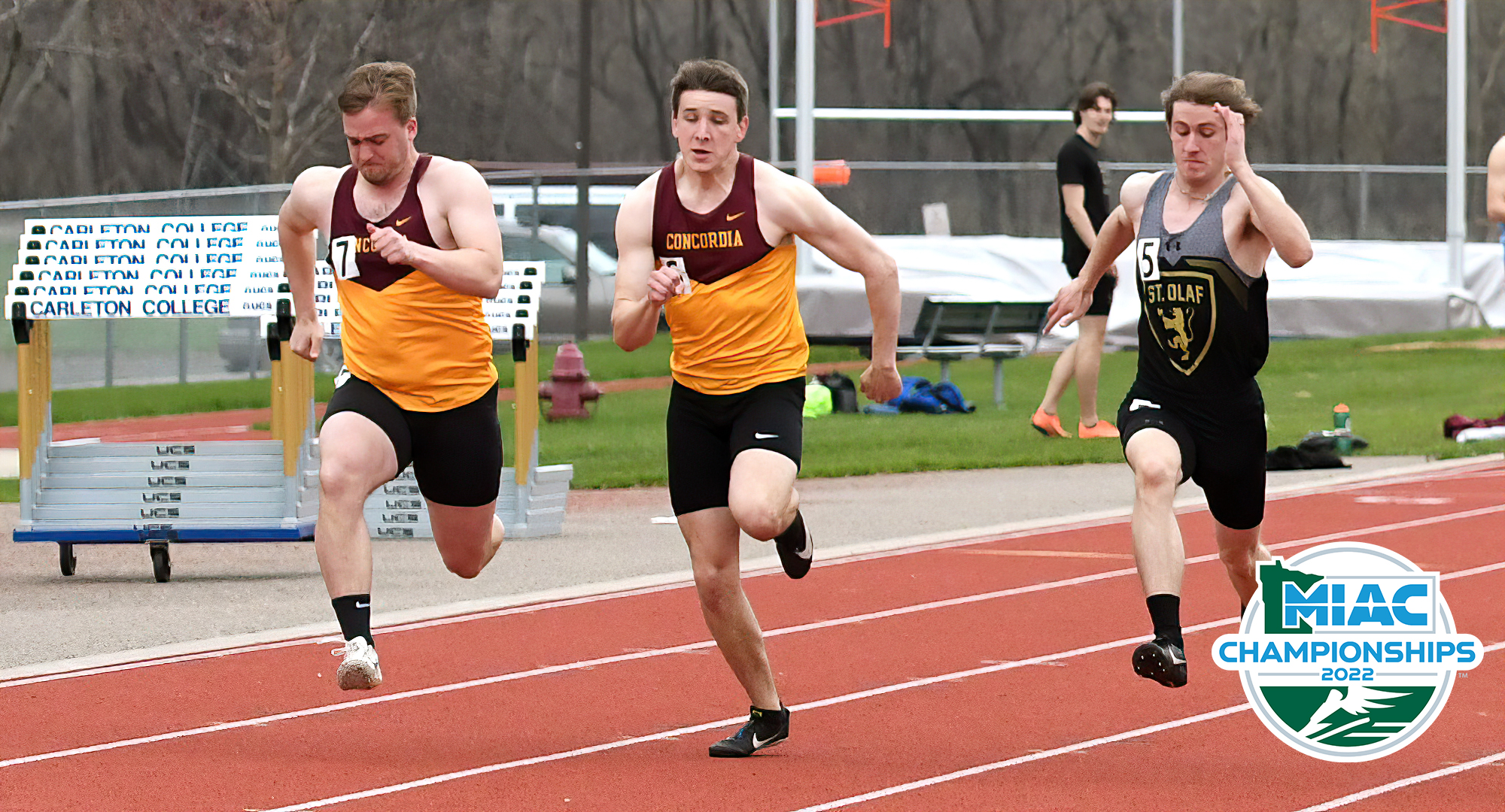 Wade Rhonemus (C) and Zach Paustian compete in the 100 meters in the MIAC decathlon. Rhonemus finished 8th. (Pic courtesy of Carleton SID)