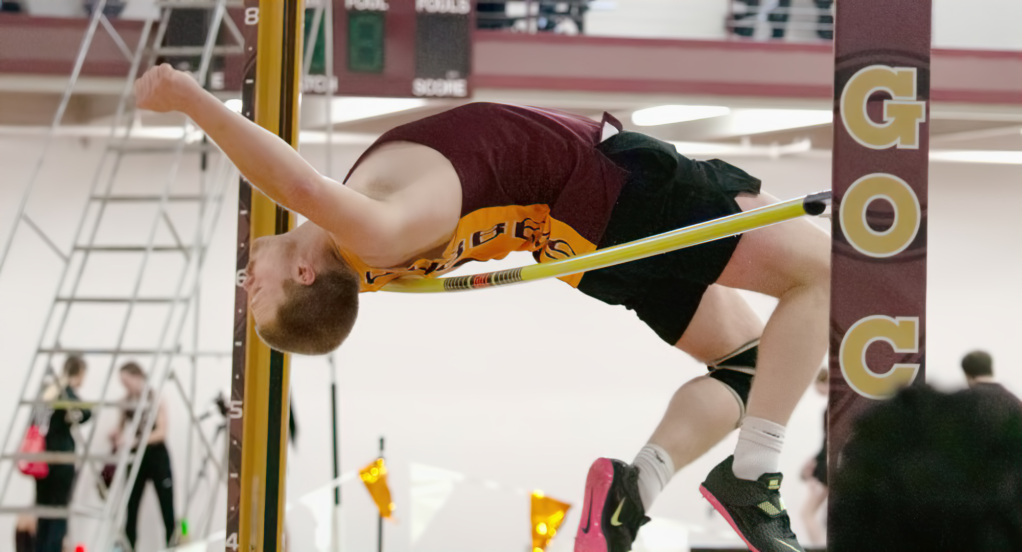 Anthony Marsh clears the bar in the high jump during the season-opening Cobber Open. He finished third with a height of 6-02.