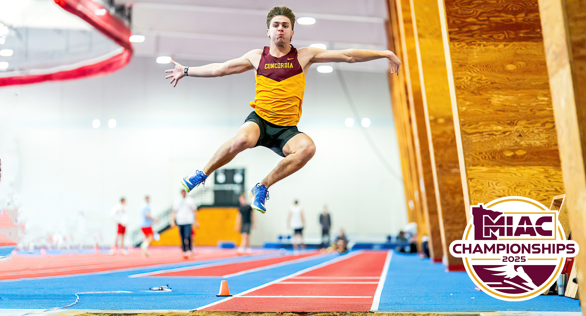 Joey Molstre flies through the air on his way to a PR in the long jump at the MIAC heptathlon. (Photo courtesy of Graham Miller, SJU).