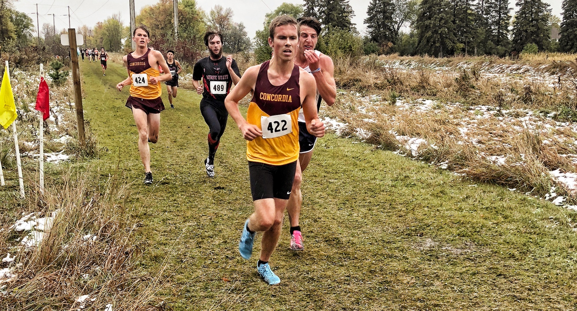 Freshman Nolan Christenson jumps in front of the pack on his way to a 9th-place finish at the Jimmie Invitational.