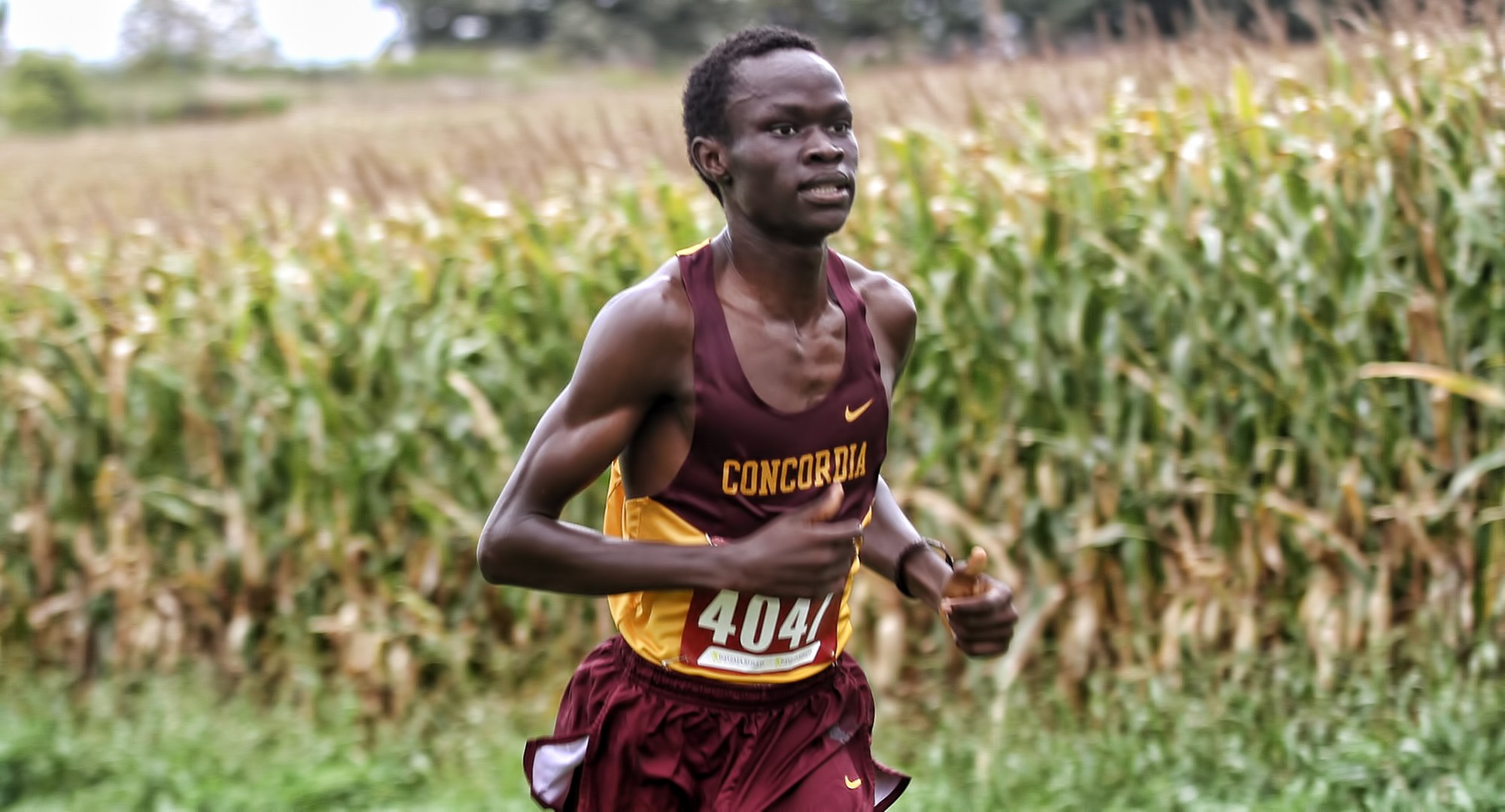 Junior Munir Isahak pulls away from competitors during the Carleton Invite on his way to posting a Top 10 finish. (Photo courtesy of St. Thomas SID)