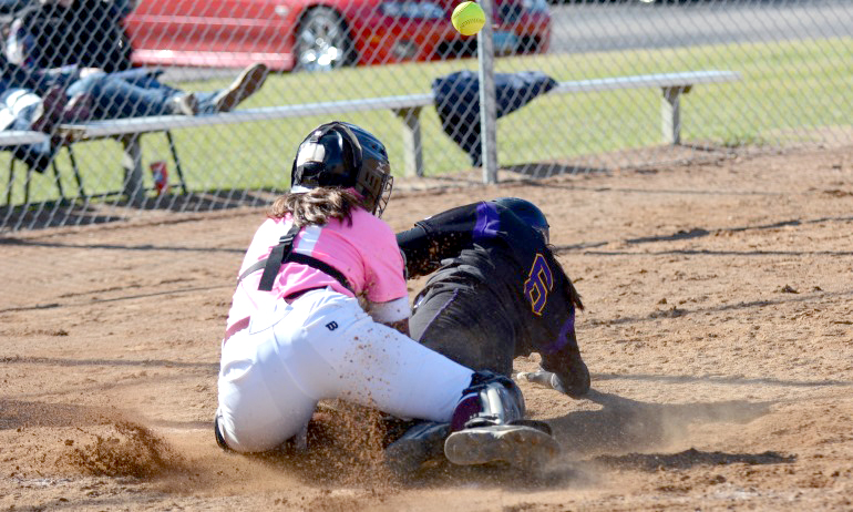 Cobber catcher mackee Hoffman has the ball come loose after trying to make the tag at home in game 1 vs. St. Catherine.