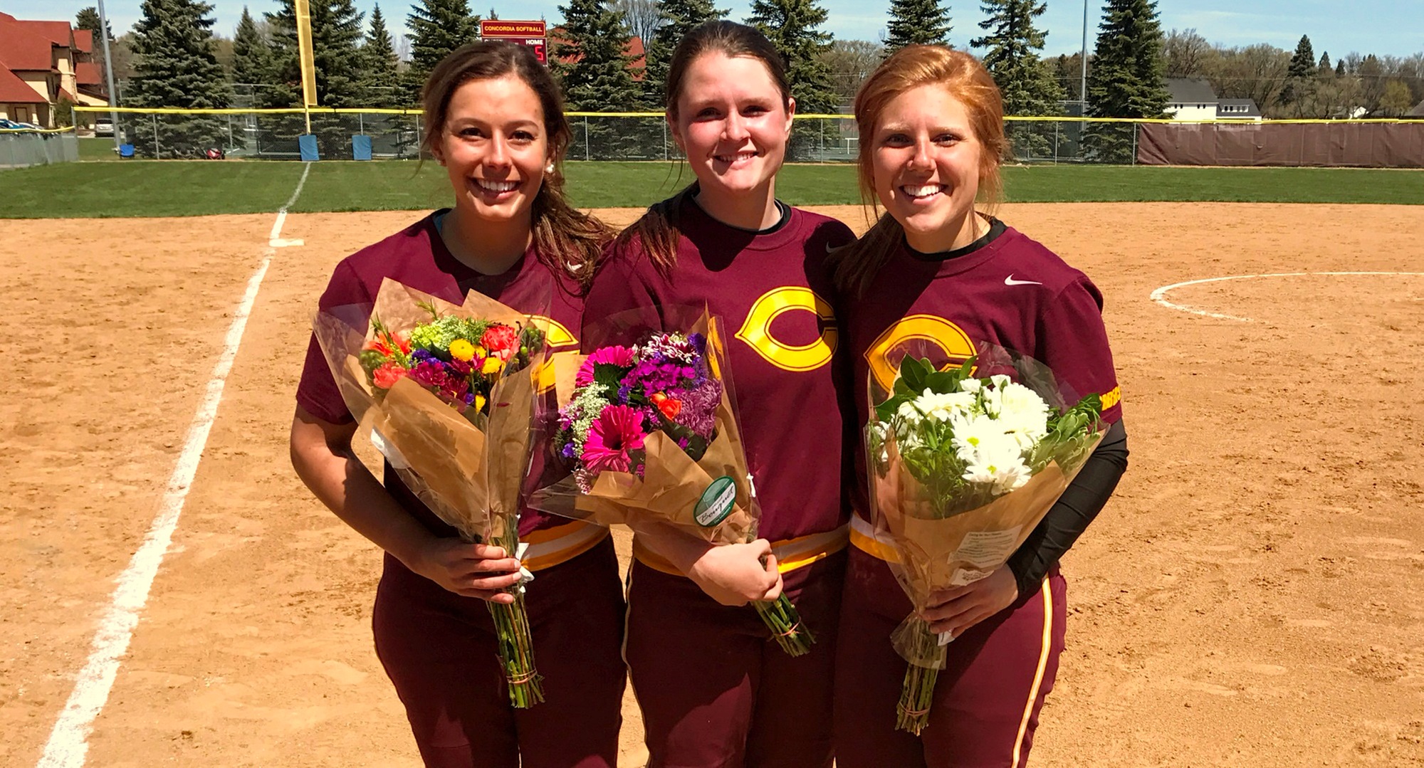 Cobber seniors (L-R) Maddie Little, Gabby Gardner and Taylor Rasmussen combined to go 5-for-10 and drive in three runs in CC's 5-1 win over SMU in Game 1.