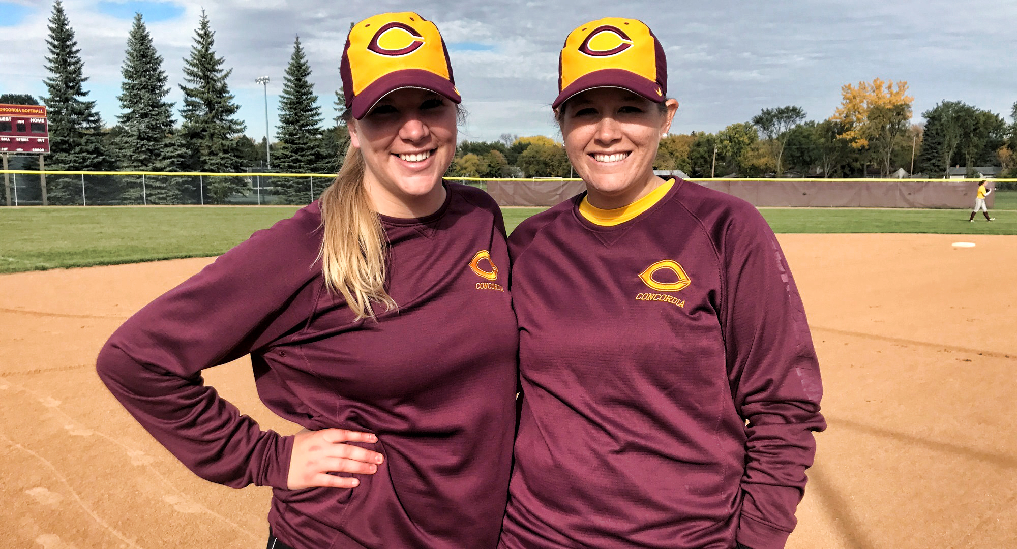 Concordia assistant coaches Krista Menke (L) and Bonnie (Belin) Carrete both played softball at NCAA Division I Meet.