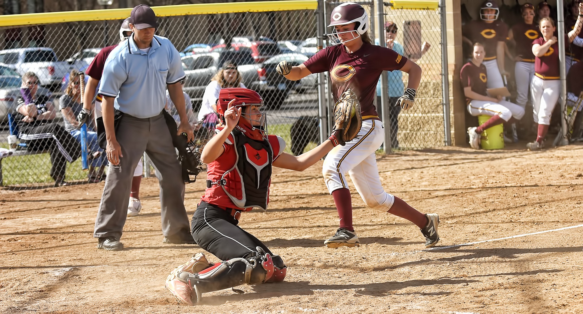 Freshman Maria Pake tries to score from third in the first inning of Game 2 in the Cobbers' DH with St. Benedict.