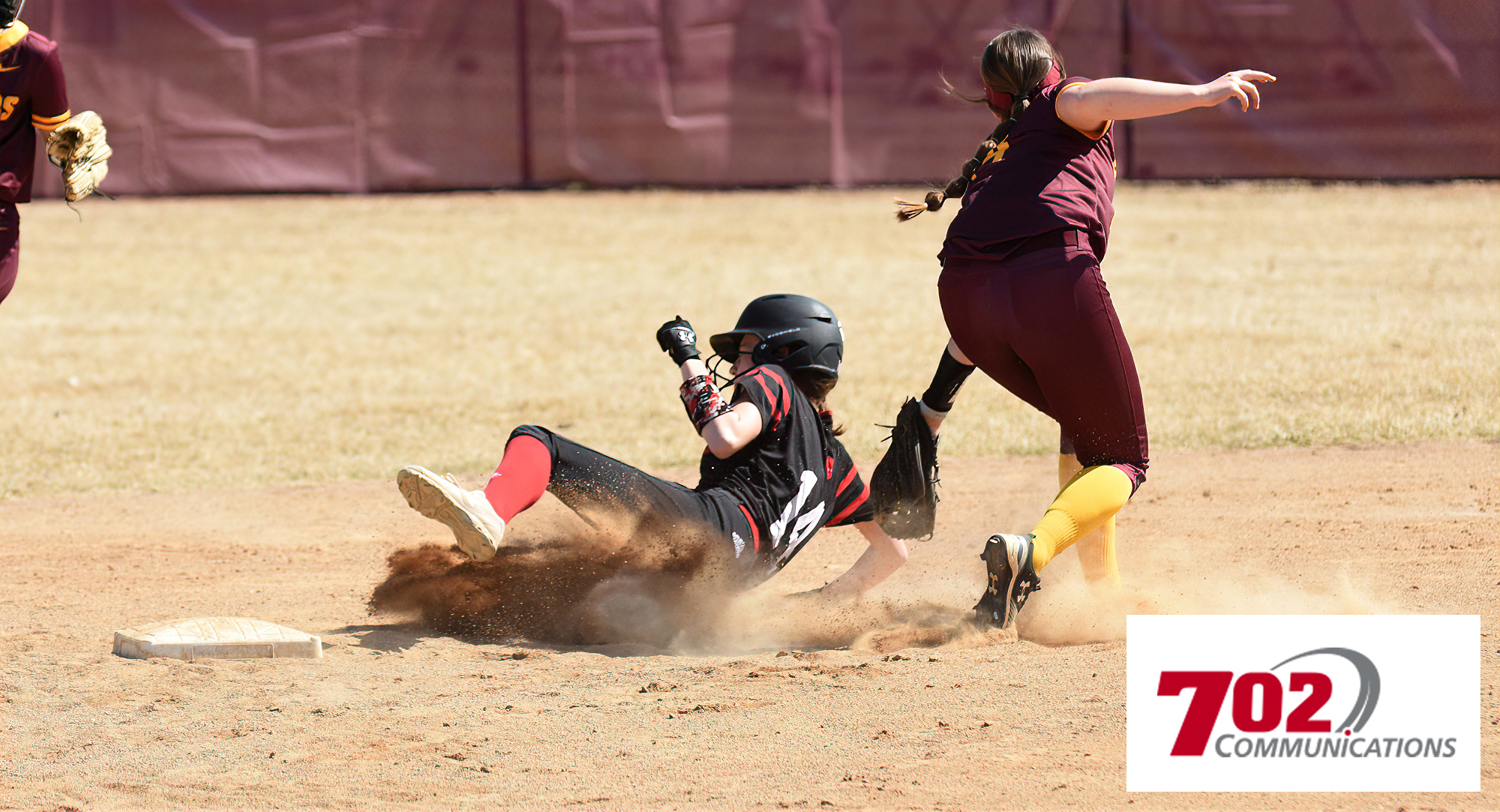 Cobber junior shortstop Kate Wensloff applies the tag to a would-be St. Ben's base stealer in the first game of the doubleheader. (Pic courtesy of Sheldon Green)