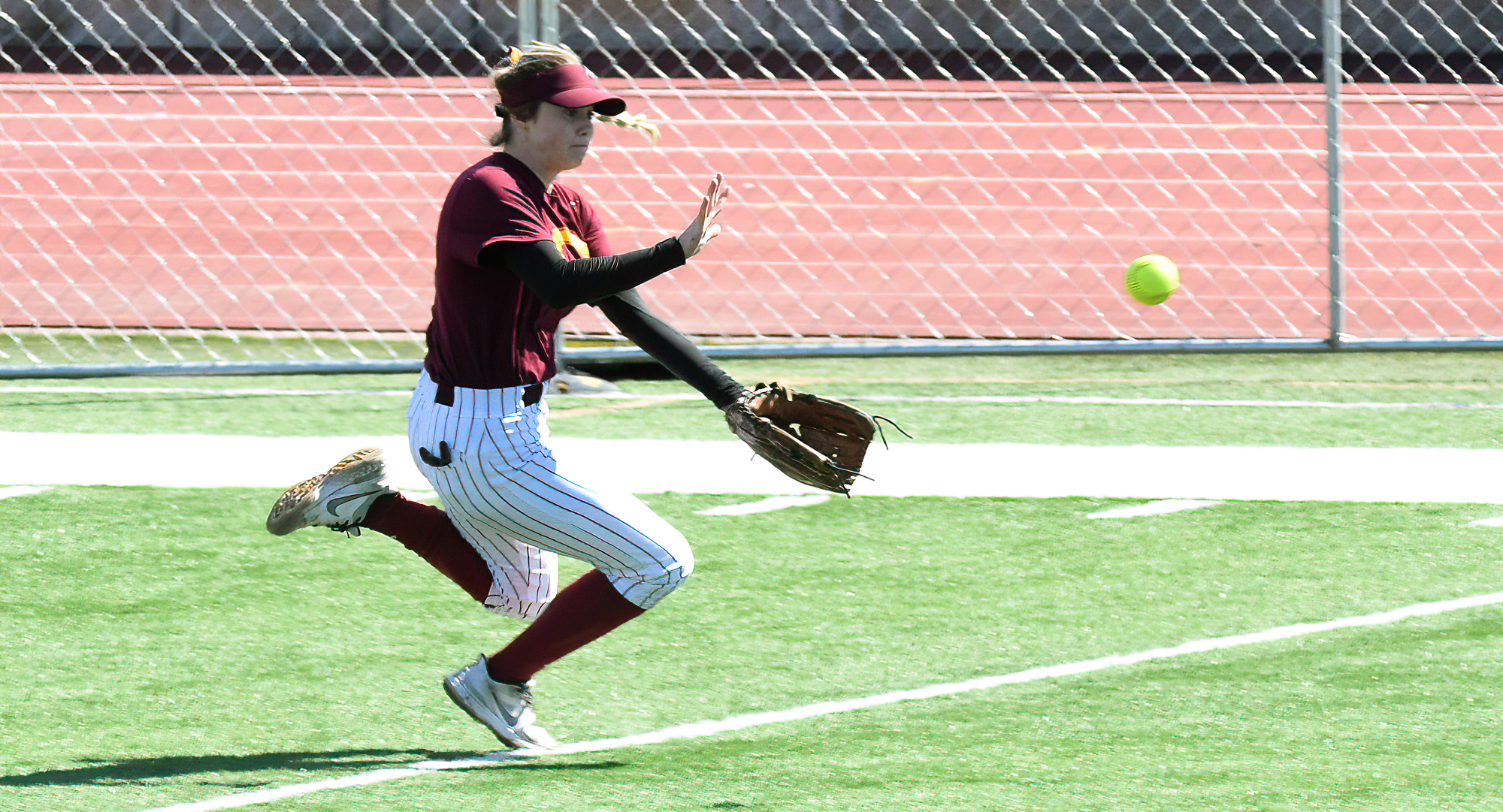 Sophomore Landry Maragos tracks down a ball in center field during the Cobbers' doubleheader with St. Olaf.