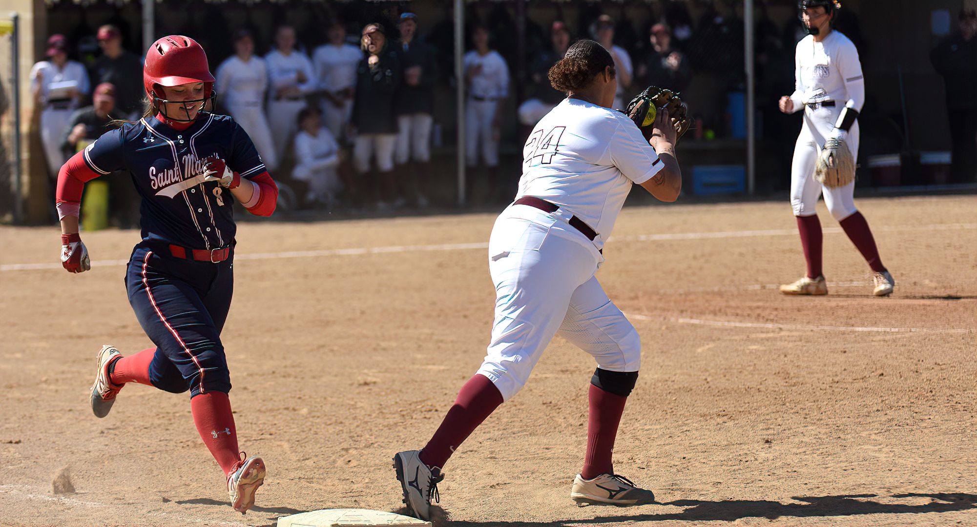 Cobber first baseman Gabby Brown hangs on to the ball to record the out during the second game of the Cobbers' DH against St. Mary's.