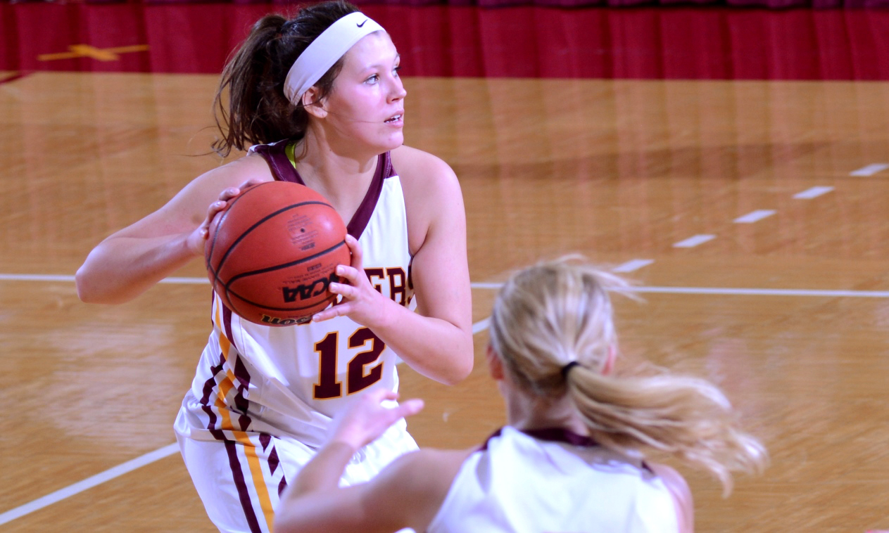 Crystal Amundson looks to make an entry pass during the Cobbers' 64-60 win over Bethel. Amundson finished the day with a career-high 17 points.