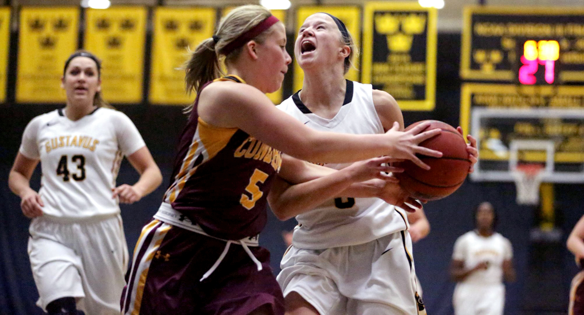 Cobber freshman Lexi Nelson goes for the steal in Concordia's conference opener at Gustavus. (Photo courtesy of Roisen Granlund and the Gustavus sports information office)
