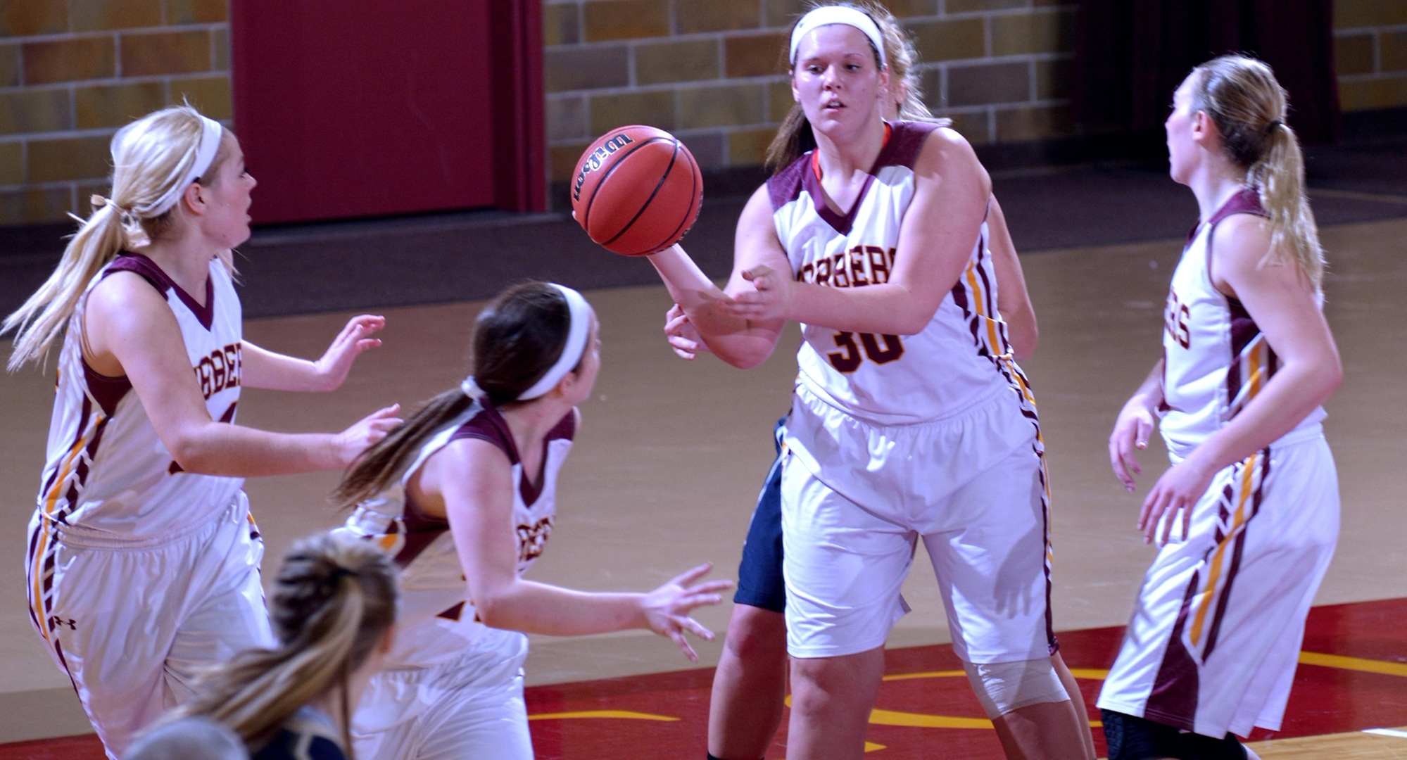 Freshman Shelby Duckstad outlets the ball after grabbing one of her career-high five rebounds. She also scored a career-high 16 points in the Cobbers' game with Bethel.