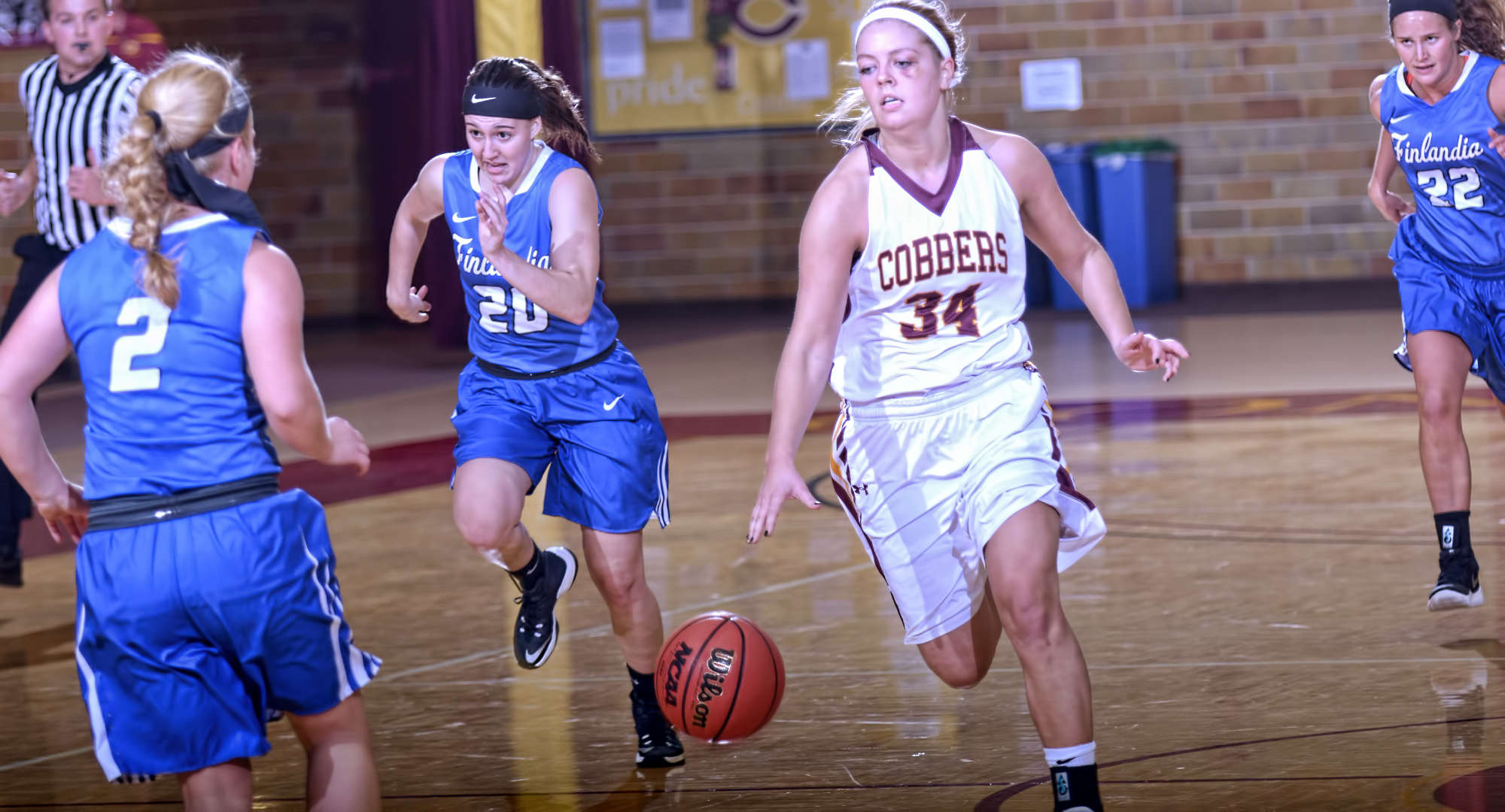 Junior Grace Wolhowe brings the ball up the court during the Cobbers' 95-52 win over Finlandia. Wolhowe finished with 13 points.