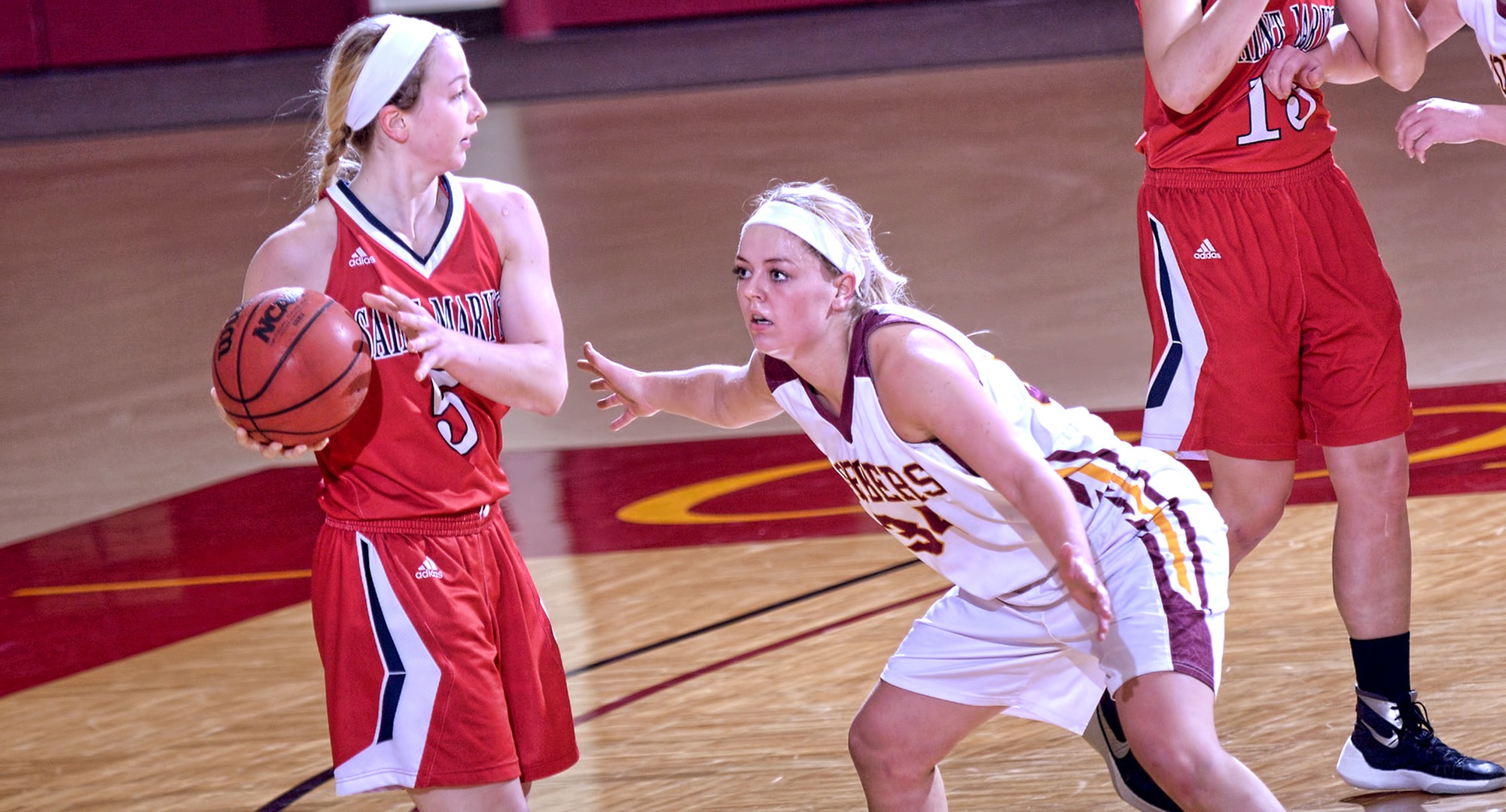 Junior Grace Wolhowe plays defense in the third quarter of the Cobbers' game with St. Mary's. She finished with nine points, four rebounds and three assists.