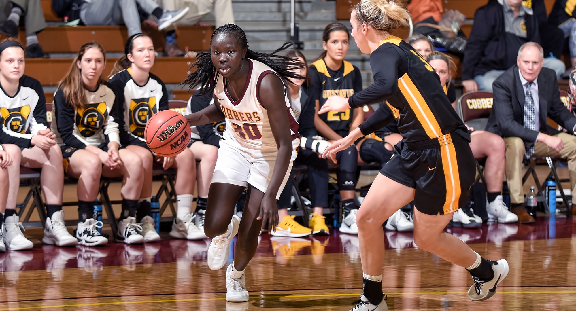 Sophomore Mary Sem drives to the basket in the first half of the Cobbers' win over #21 Gustavus. Sem finished with a game-high 20 points and added eight rebounds.