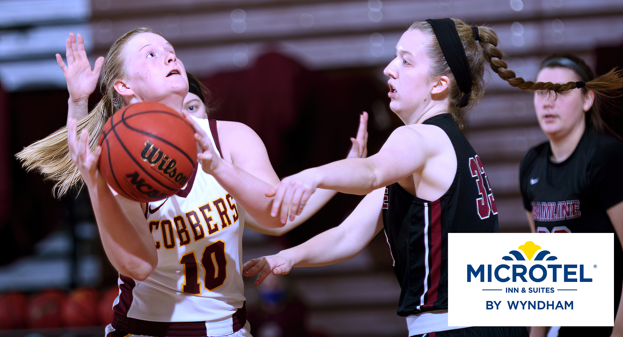 Senior Elizabeth Birkemeyer drives to the basket during the second half of the Cobbers' game with Hamline. She finished with a career-high 21 points on the night.