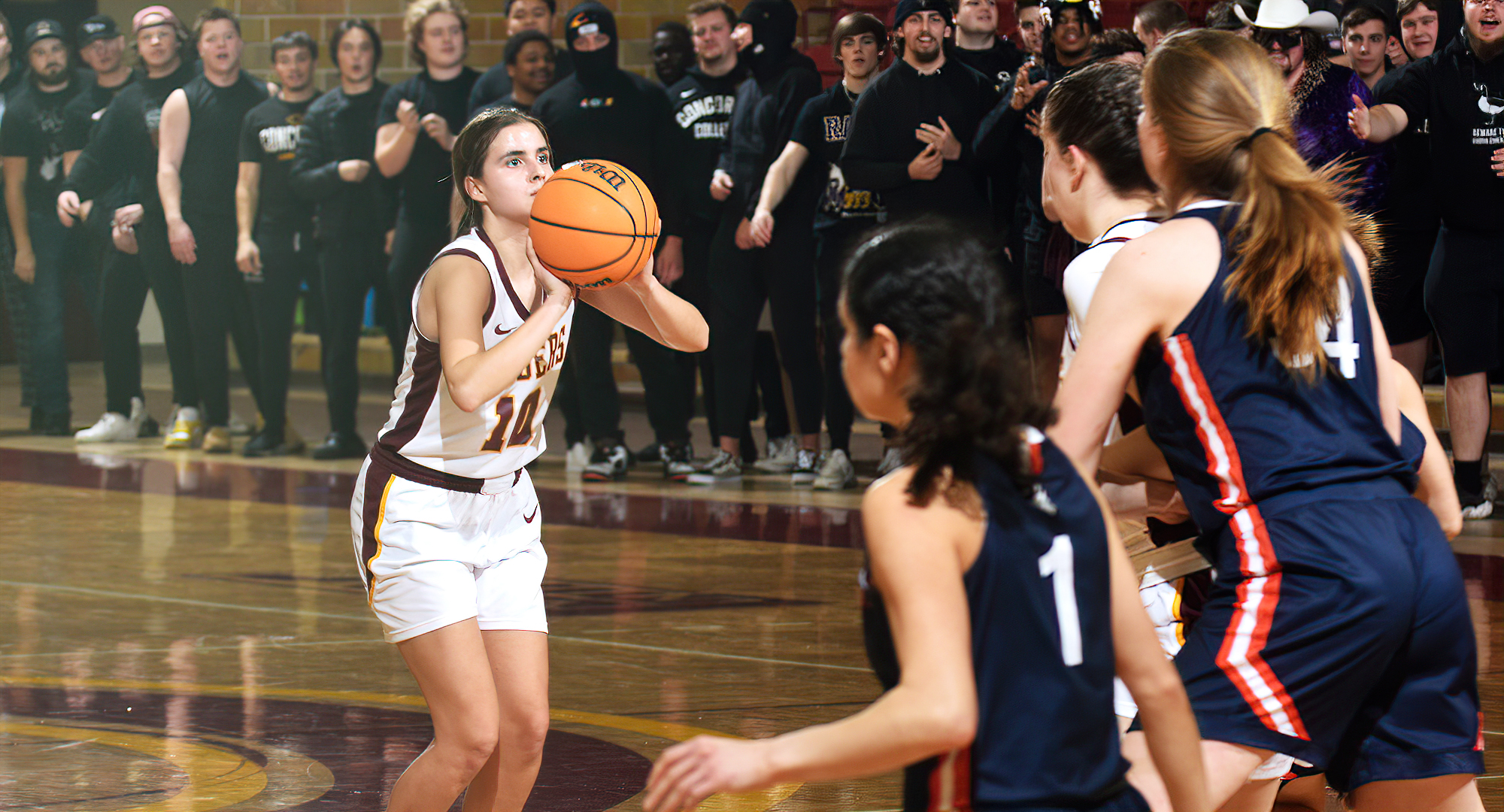 Carlee Sieben gets ready to knock down one of her three shots from outside the arc during the Cobbers convincing win over Macalester.
