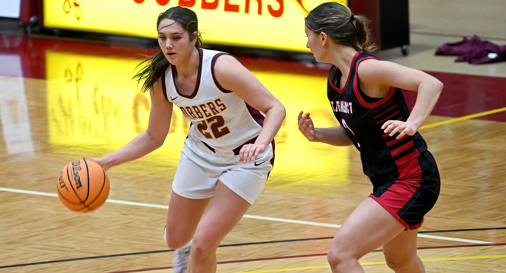Makayla Anderson drives to the basket on the way to scoring two of her career-high 25 points in the Cobbers' win over St. Benedict.