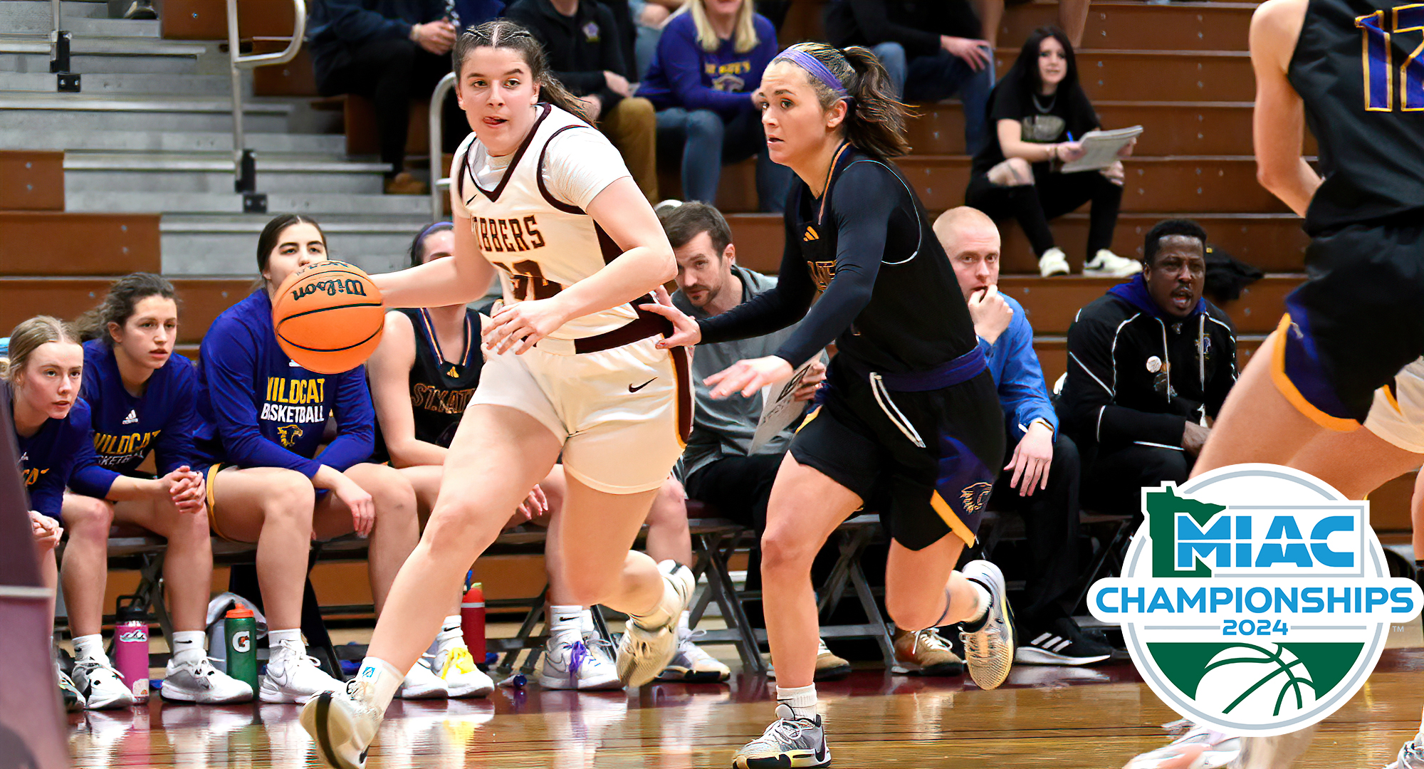 Greta Tollefson drives past a St. Kate's defender in the first half of the Cobbers' semifinal win. Tollefson finished with a career-high 12 rebounds.