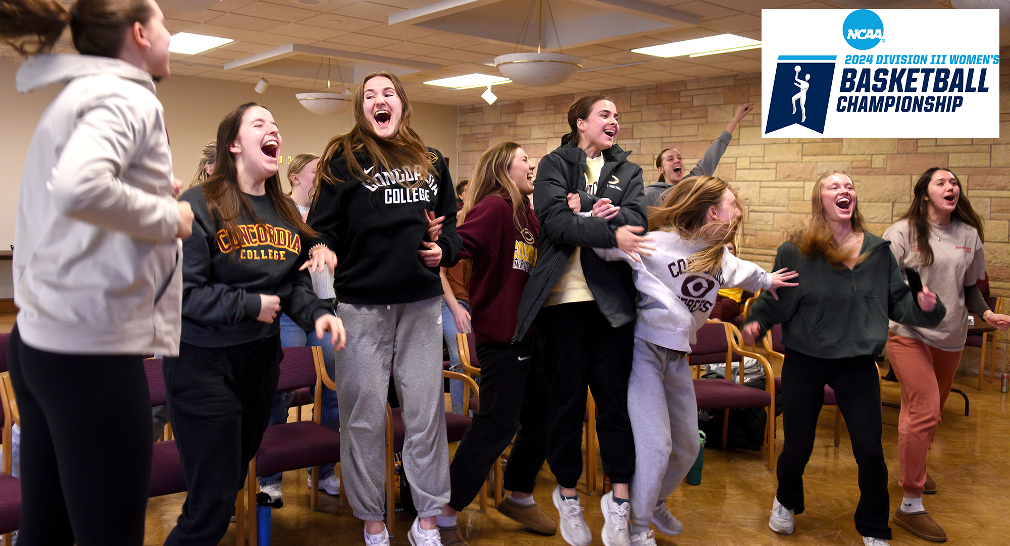 Members of the Cobber women's basketball team react to the announcement that they earned a spot in the NCAA Tournament.