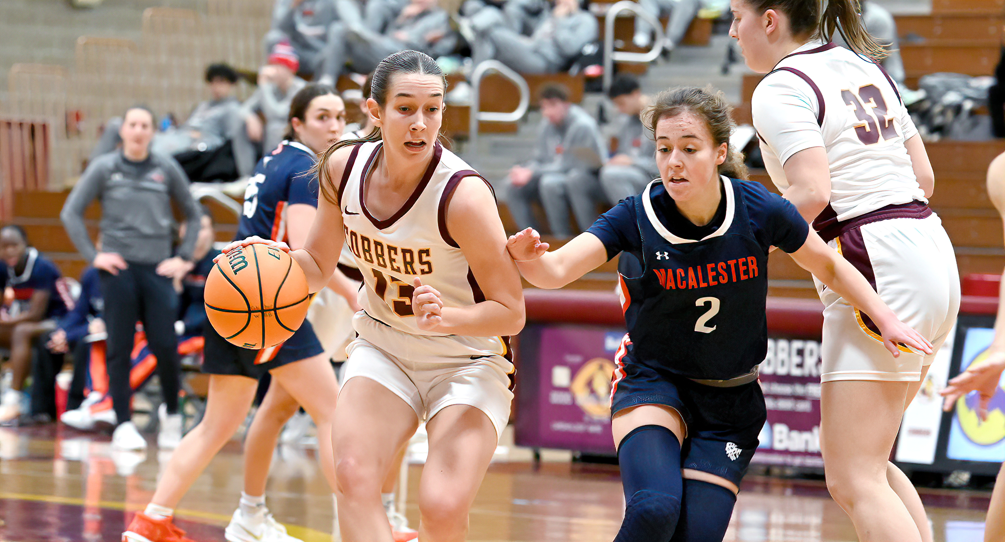 Taylor Safranski shakes off a Macalester defender during the Cobbers' 64-59 win over the Scots. Safranski had three assists in the game.