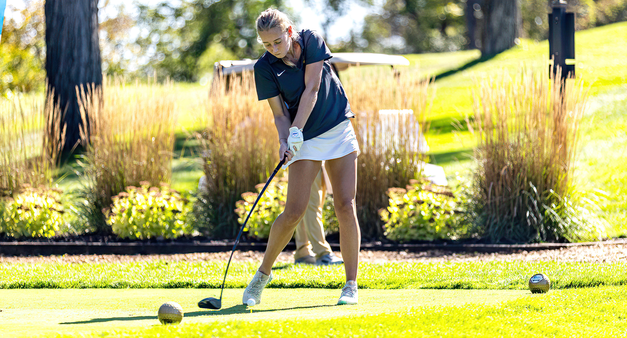 Addicyn Zimmerman tees off at the MIAC Championship Meet. She led the Cobbers with three straight scores of 87. (Photo courtesy of Olivia Shaw)