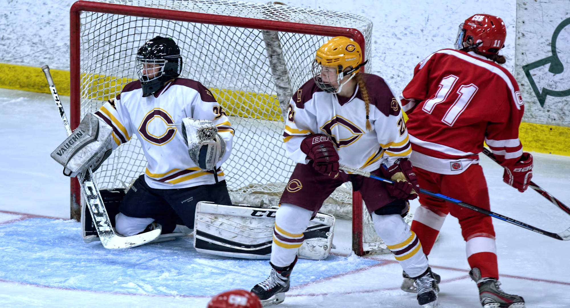 Freshman Megan Mohr (R) had a career-high four assists and goalie Amy Jost made 18 saves in the Cobbers' series-sweeping win over St. Benedict.